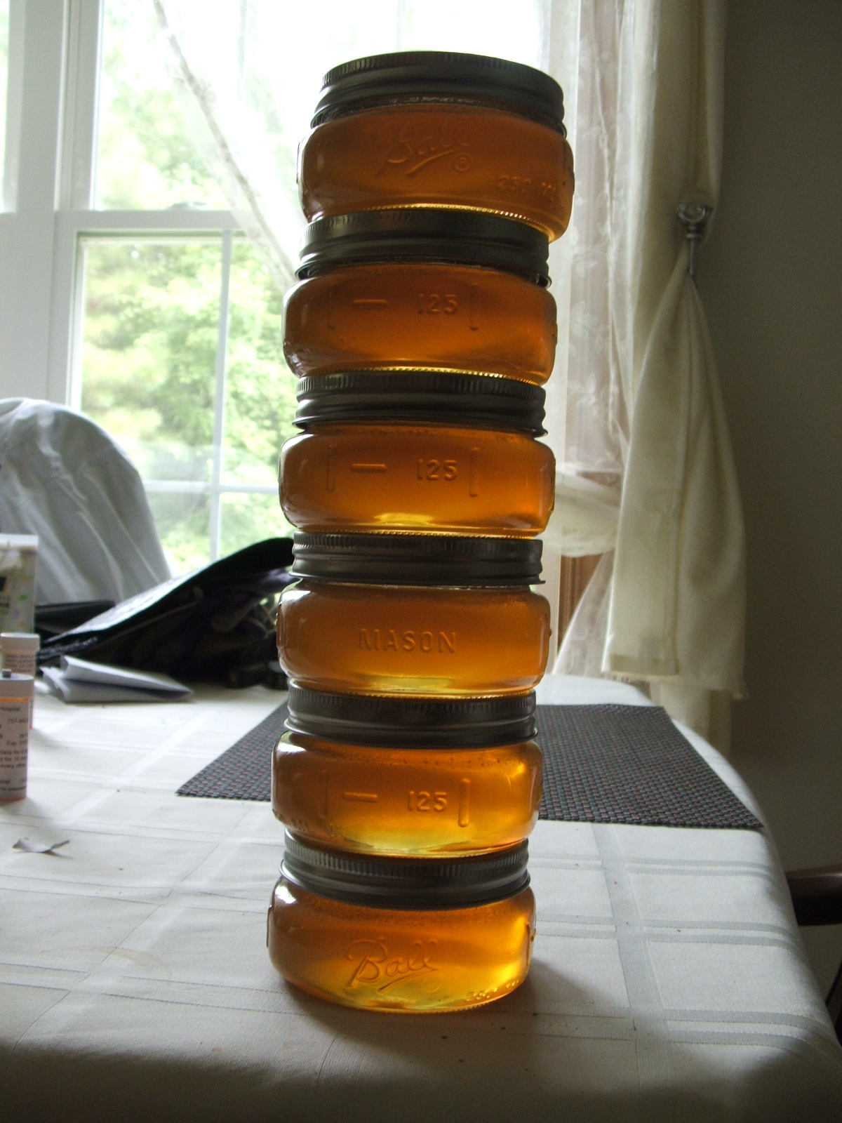 Crush and strain honey from TBH
