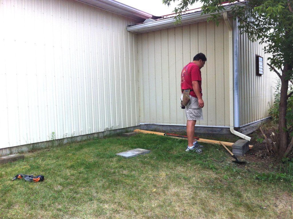 Day 1 laying the foundation. we didn't really have a level ground to work with so Lito put down concrete blocks so the floor would be level