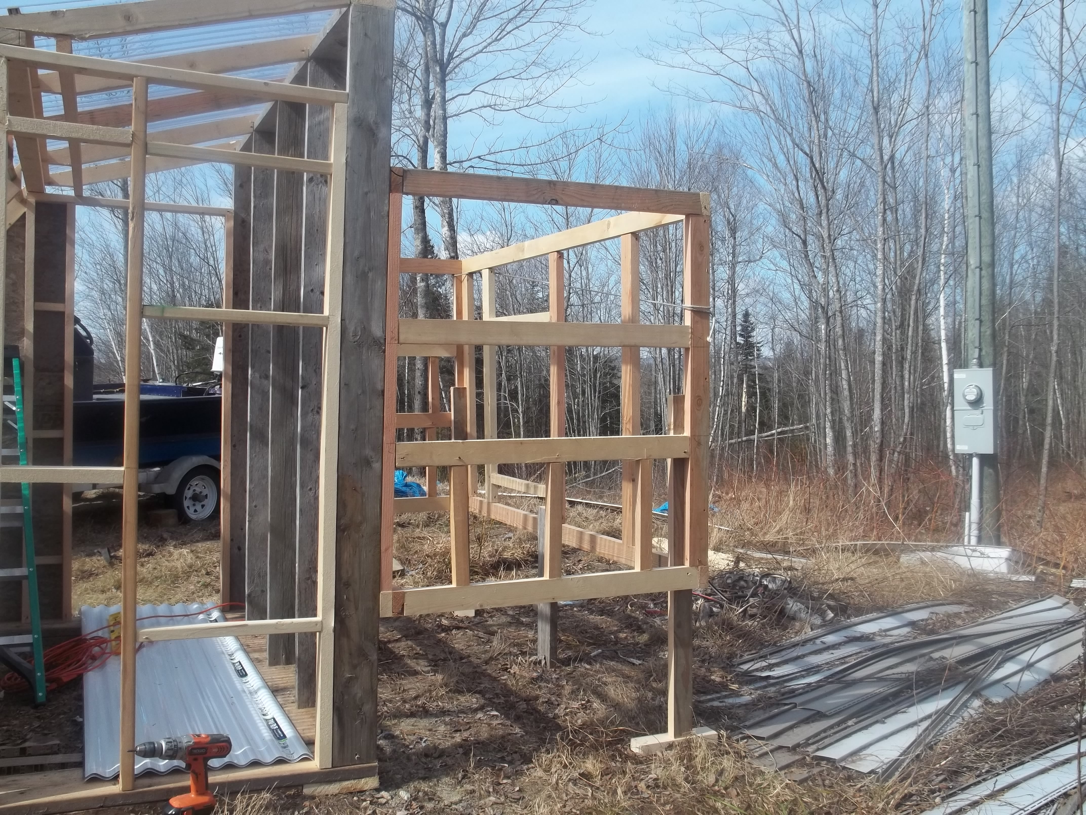 Day two:  Coop framed.  nesting box on each side...6 boxes, 13 laying hens