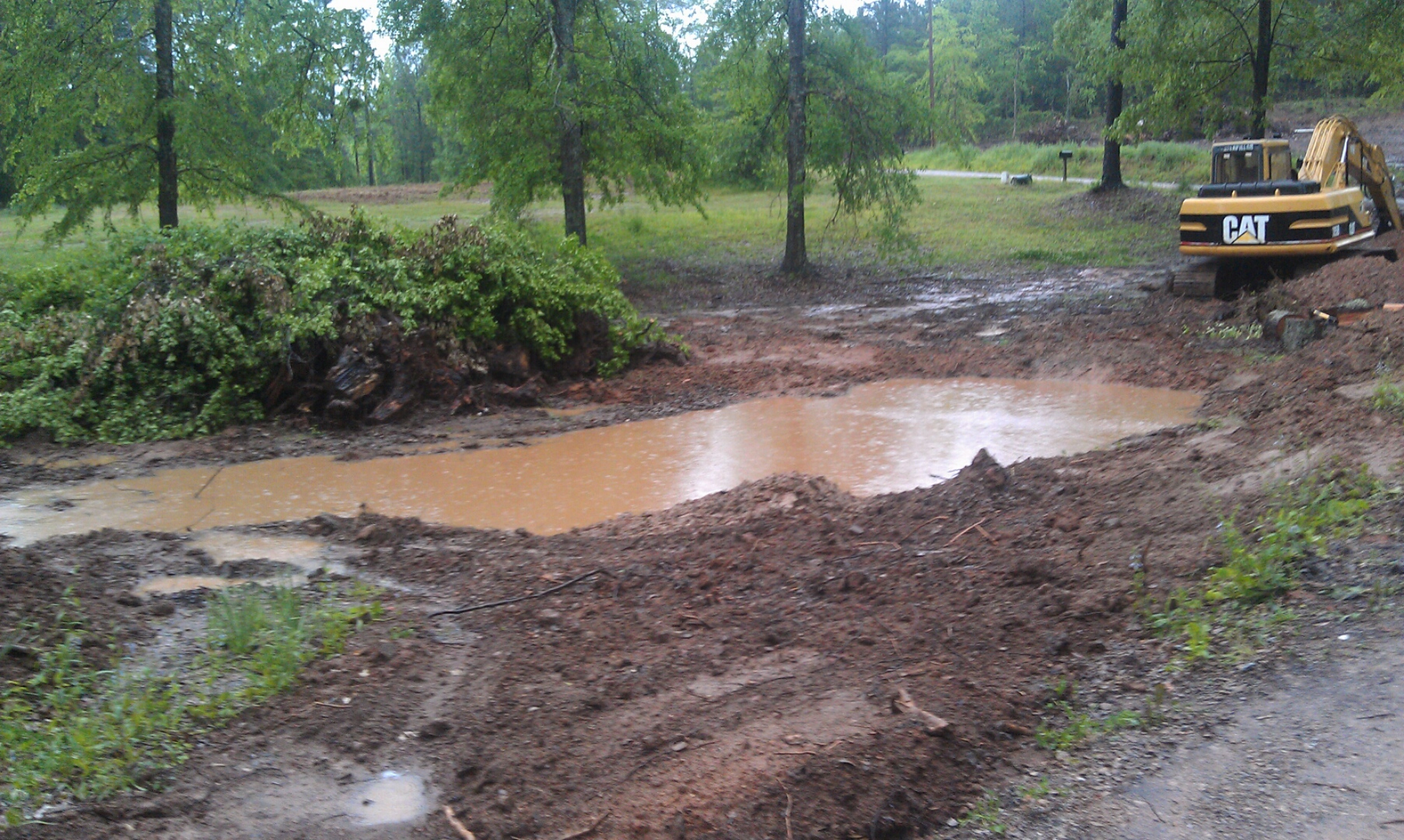 Digging the pond for the ducks.
