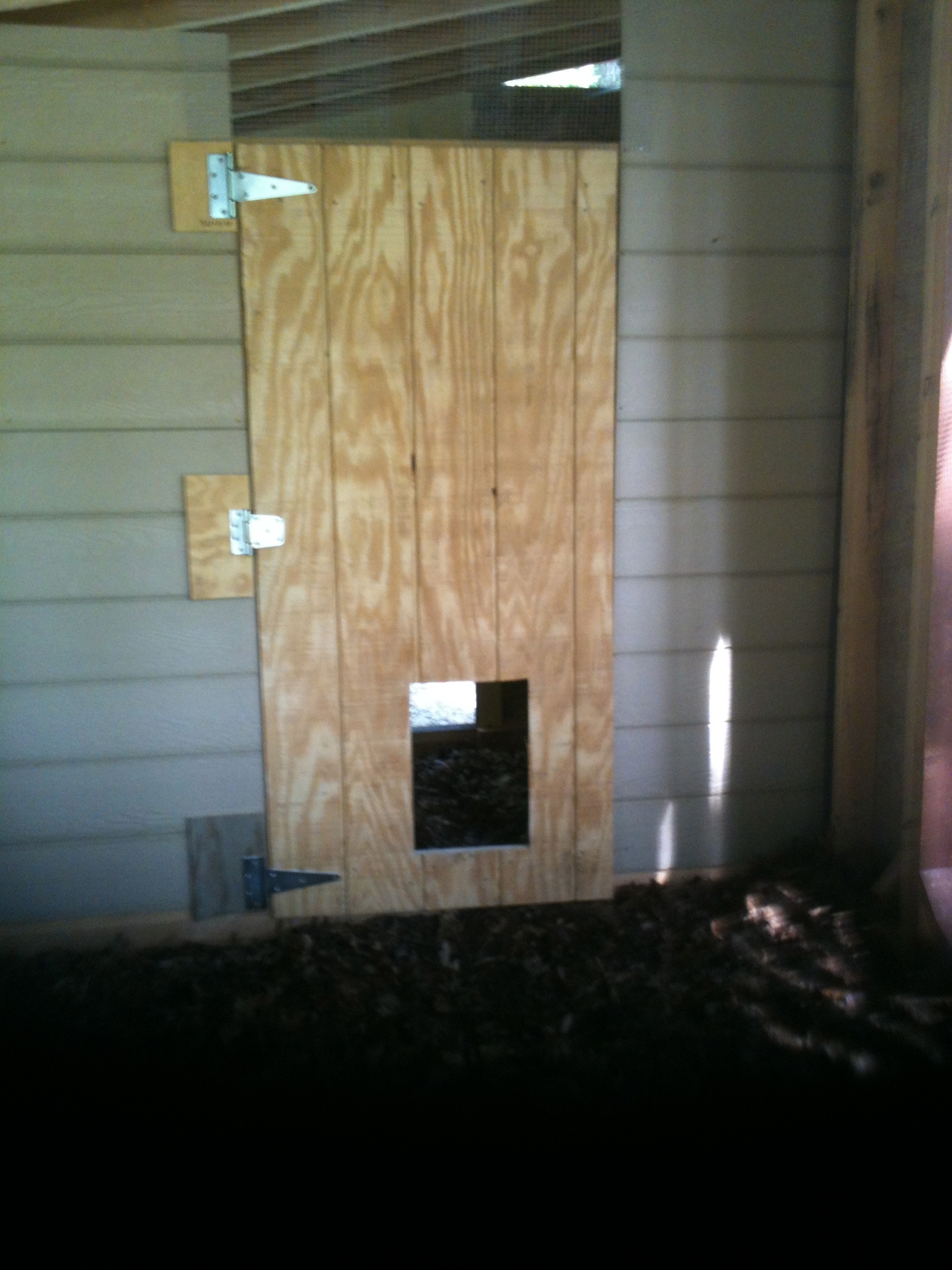 Door between coop and run. It says wide open in warm weather 24/7. Since this winter's cold, I shut it every night and days that are very cold, cloudy, windy. The "pop door" stays open, unless I'm trying to keep them in one area--to clean out the coop, for example.