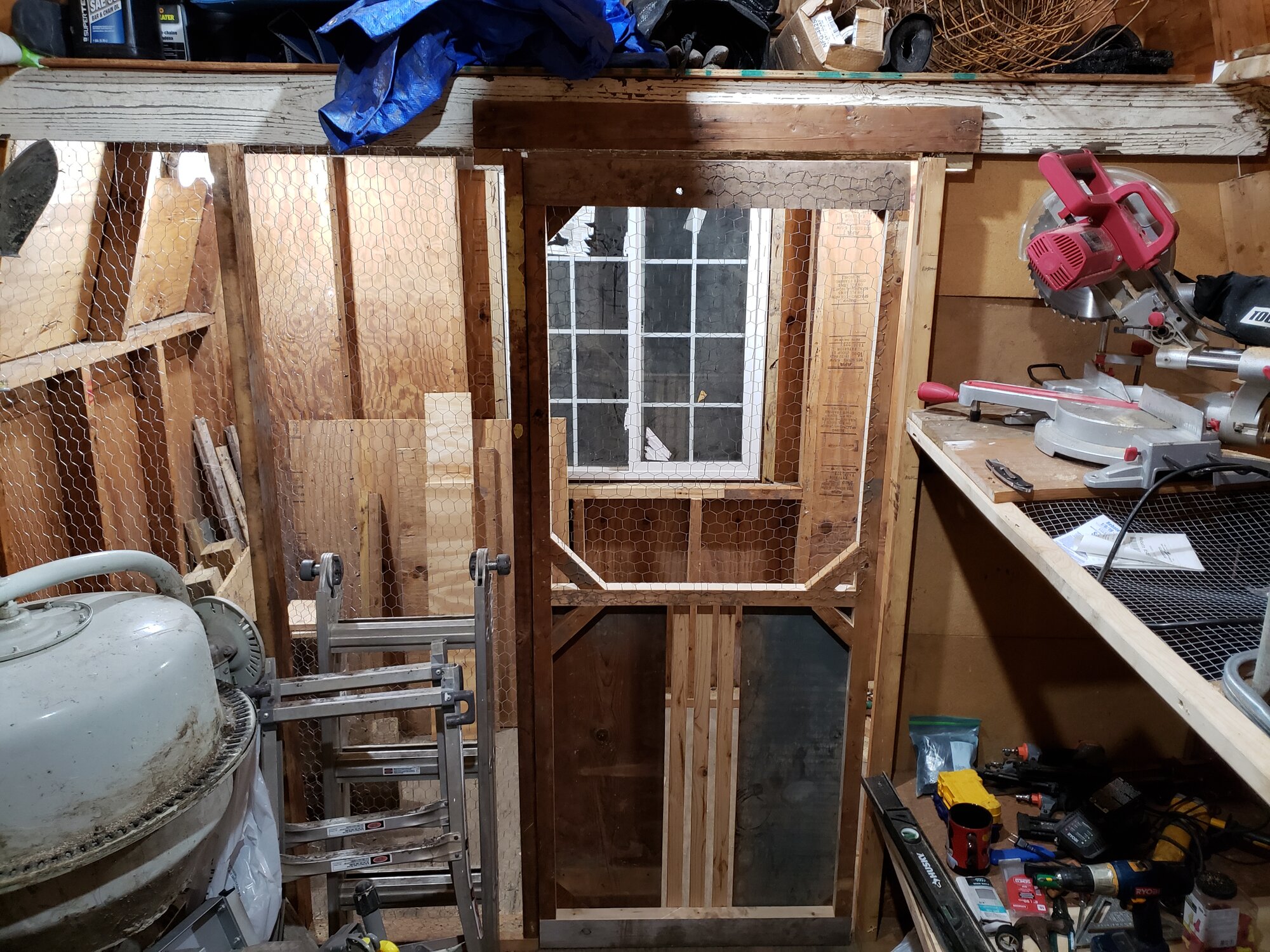 door built and window installed - shed coop build