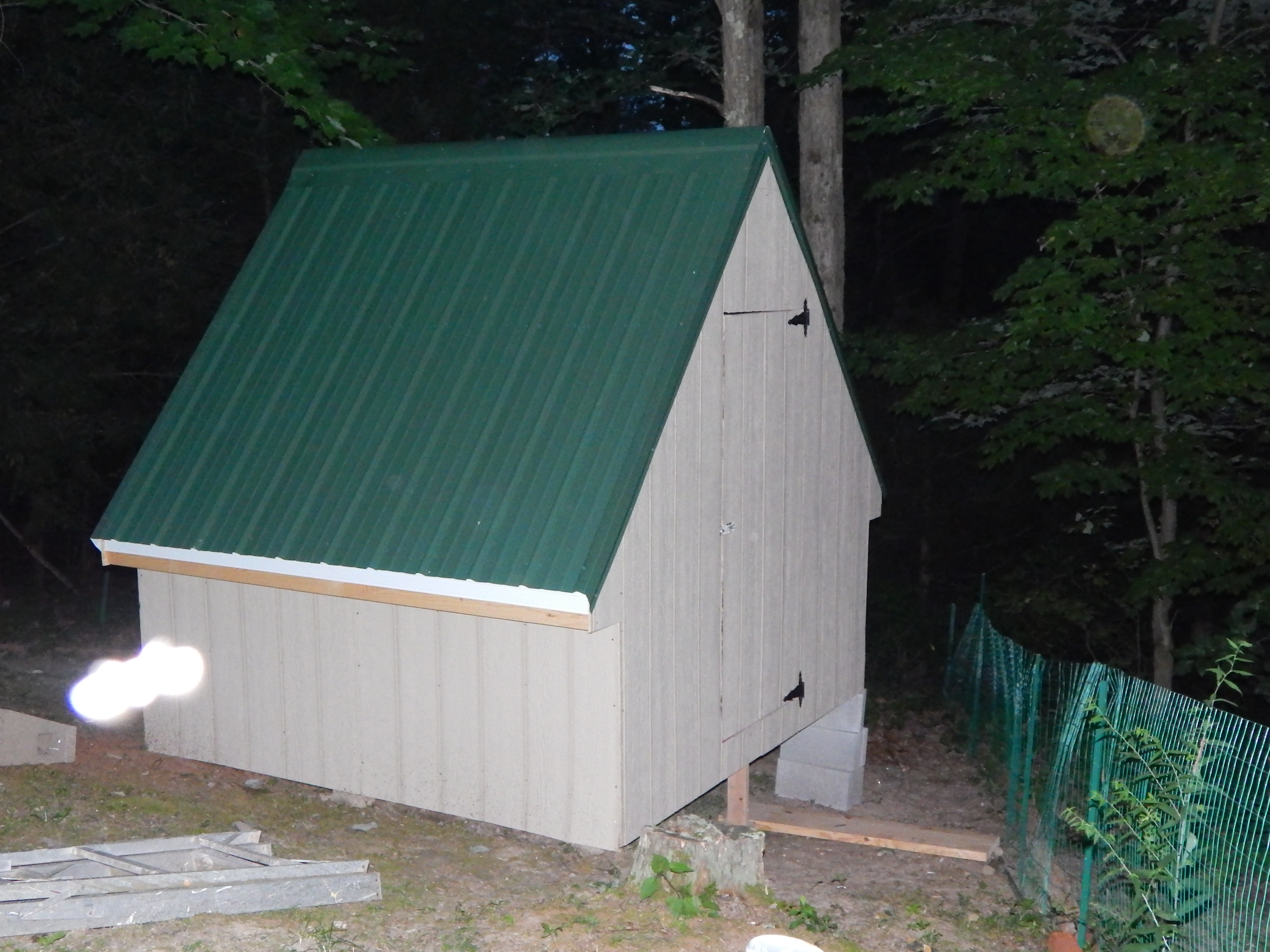 Door is on with a slide bolt latch. I will finish the floor up tomorrow and I think the girl might be sleeping in their new home tomorrow night. Going to finish the final touches with the girls under foot. a vent window needs to go above the door.