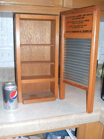 Dubl Handi wahsboard nic-nac shelf (open)
Top 2 shelf heights are adjustable