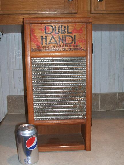 Dubl Handi washboard nic-nac shelf (closed)
Has a little rust - but I think that makes it look better.  (o: