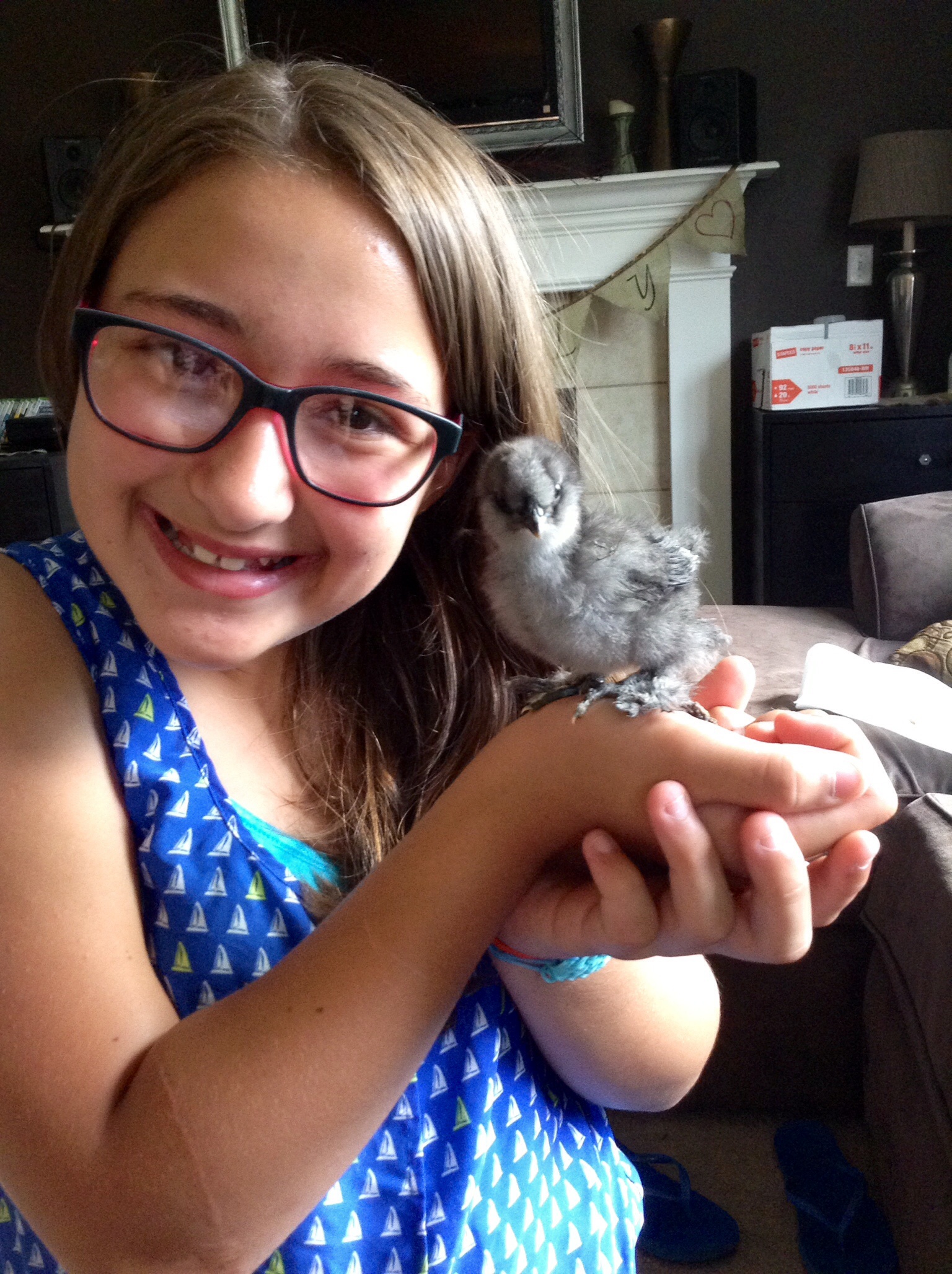 Ellie with her chick Nugget :) Nugget is a blue silkie like her sissy