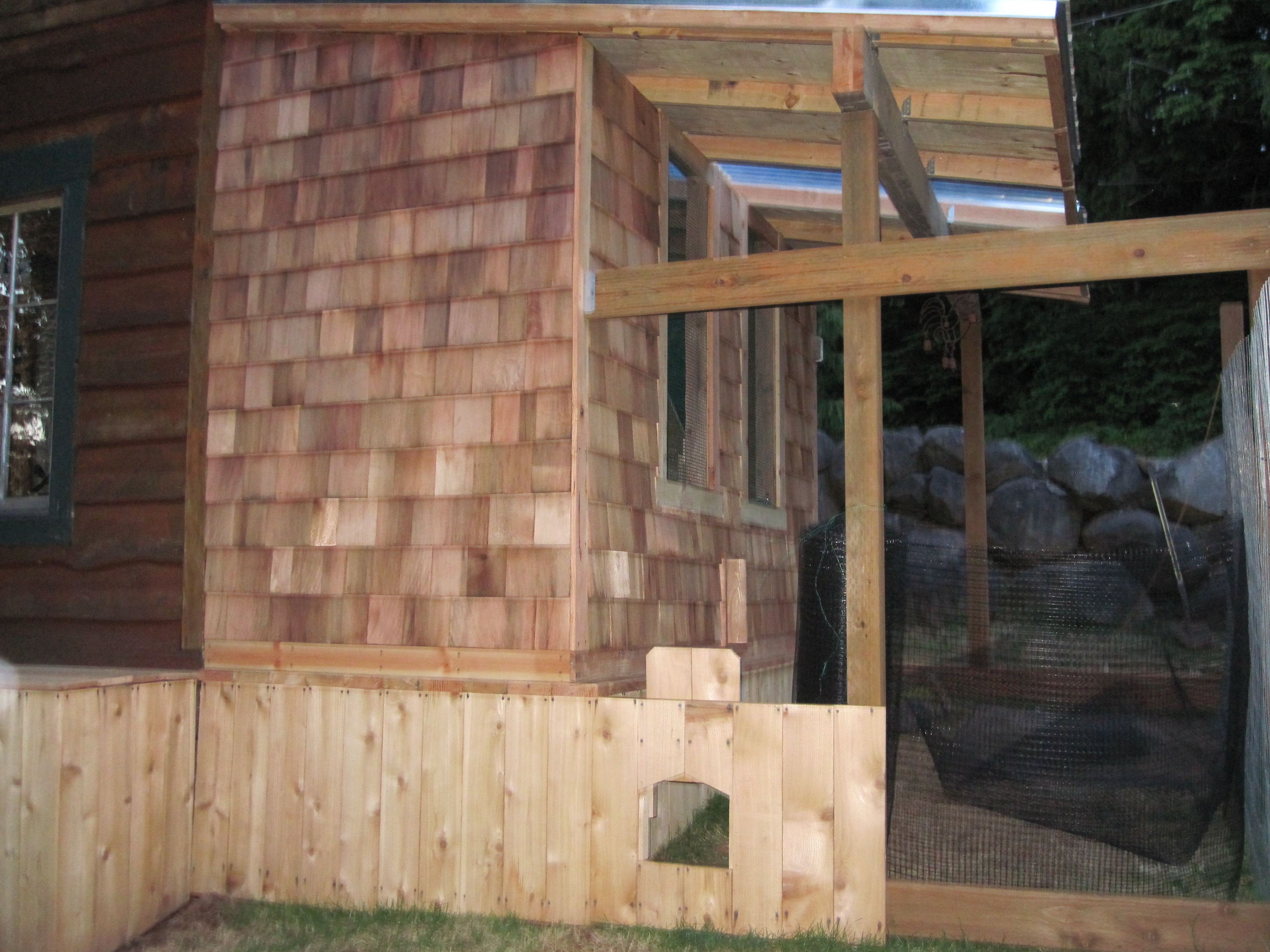 Enclosed coop and door to the soon to be chicken run.