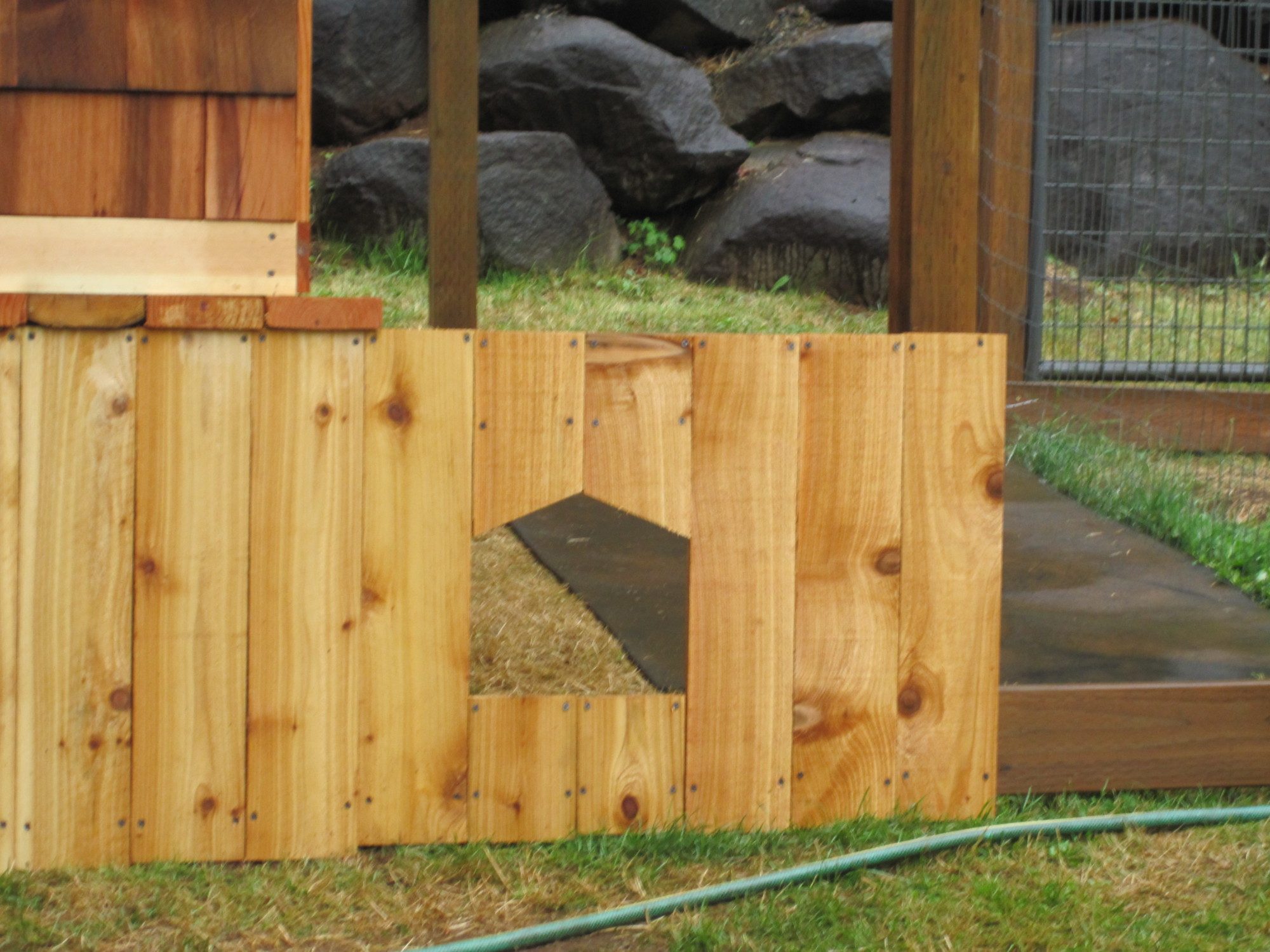 Exterior chicken door, leading to a large turn out portion and the garden space when not in use Oct-April.