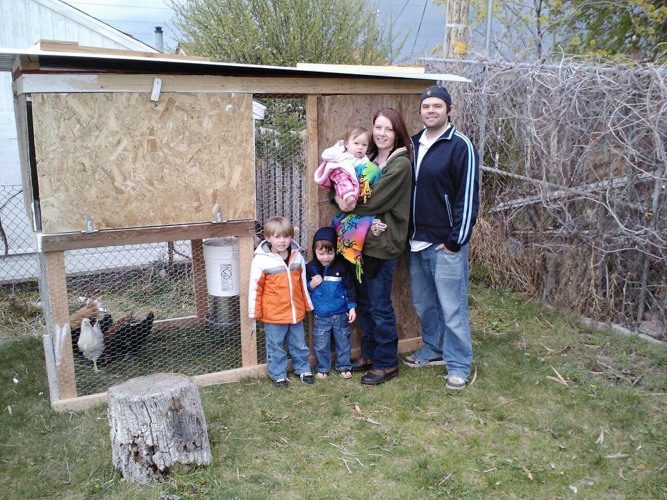 Family pic in front of the coop