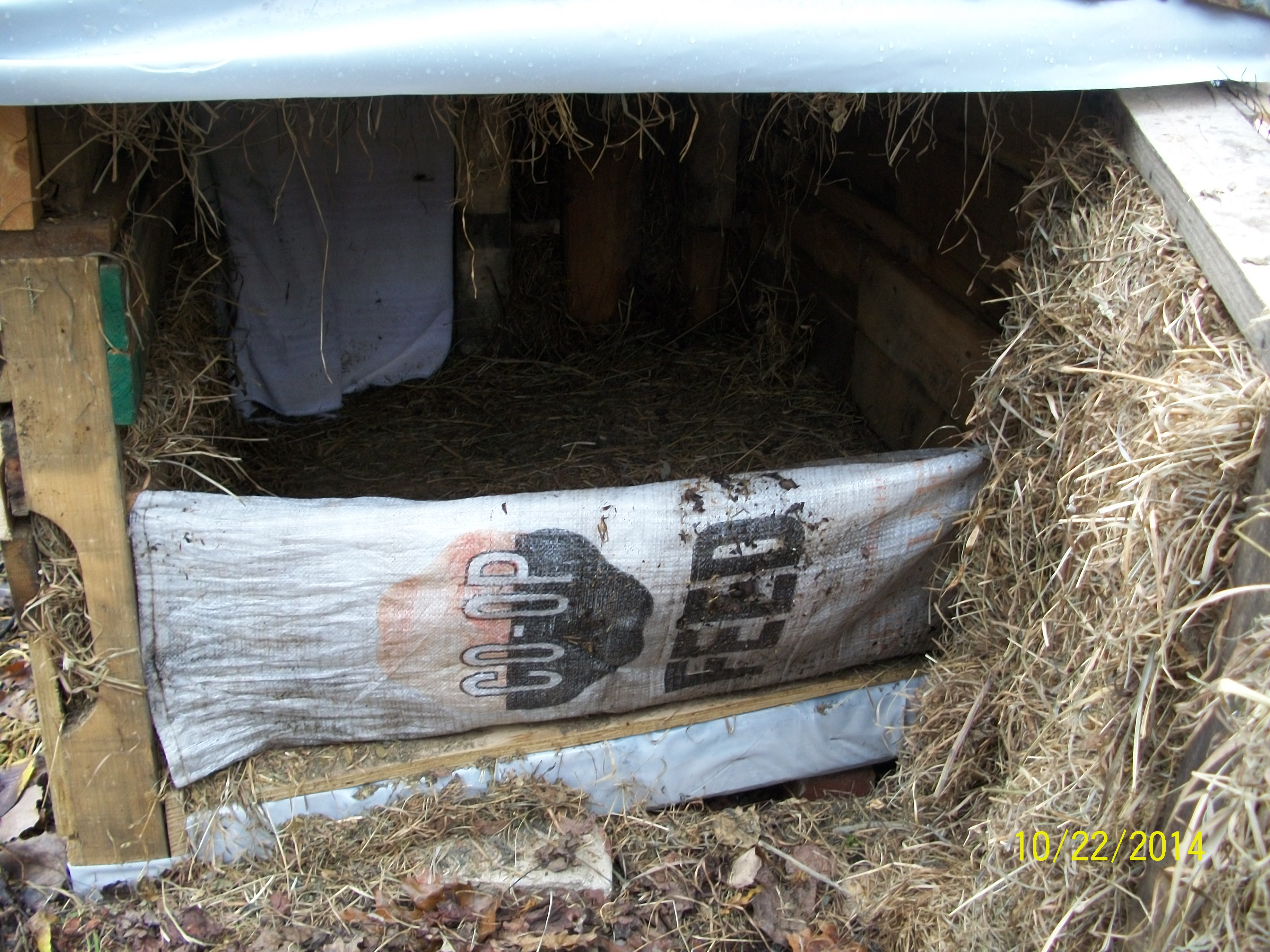 Feed sack helps me contain the bedding materials when I open the back wall up.
