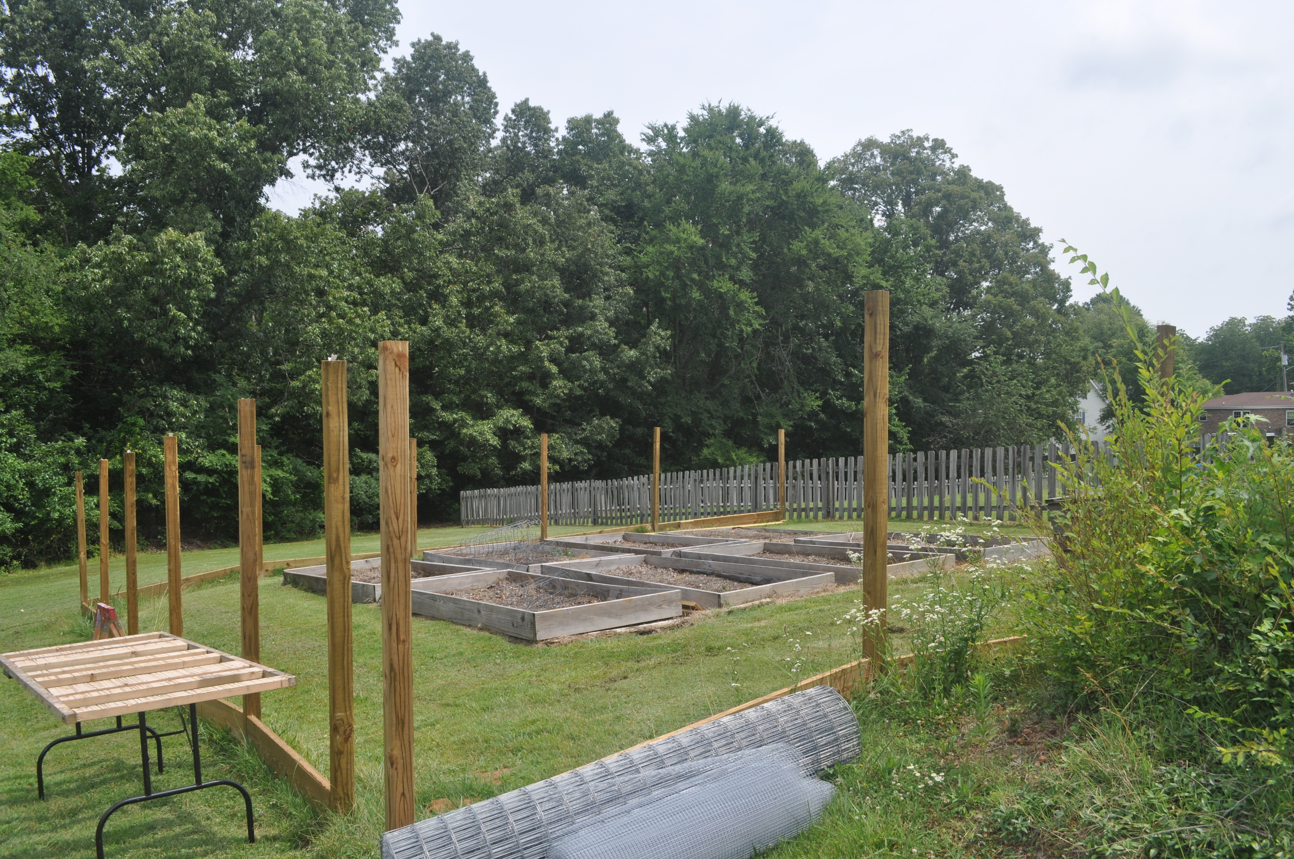 Fencing in progress for duck run and garden