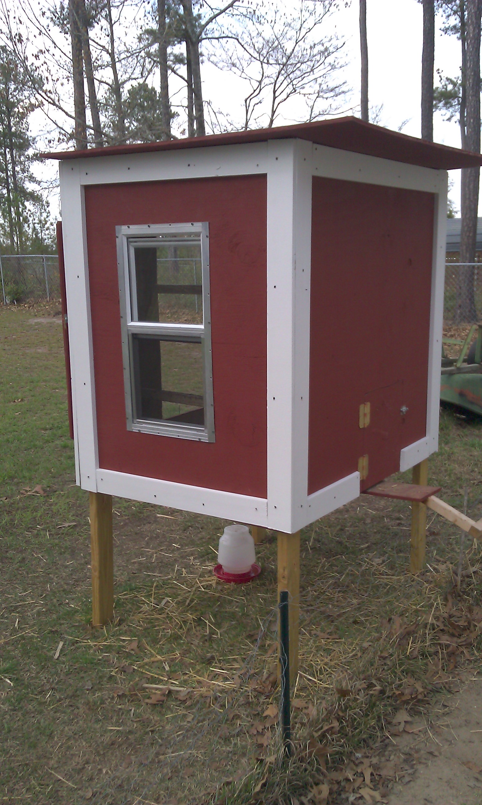 finally finished. Installed a window and trim...front view.