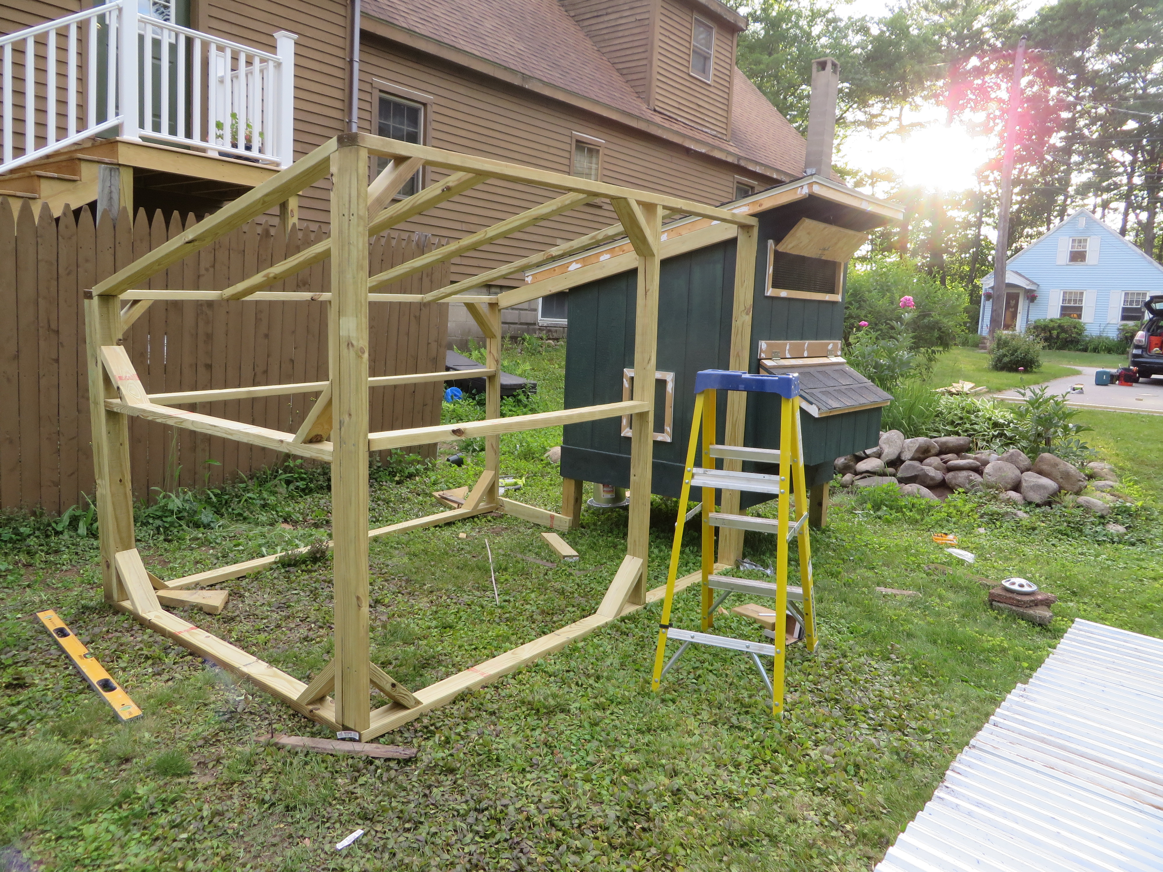 Finally starting to build the run! As you can see the season has changed. The chickens were almost 2 months old and we were very ready to move them out of the house! The run is made from 2"x4" pressure treated lumber.