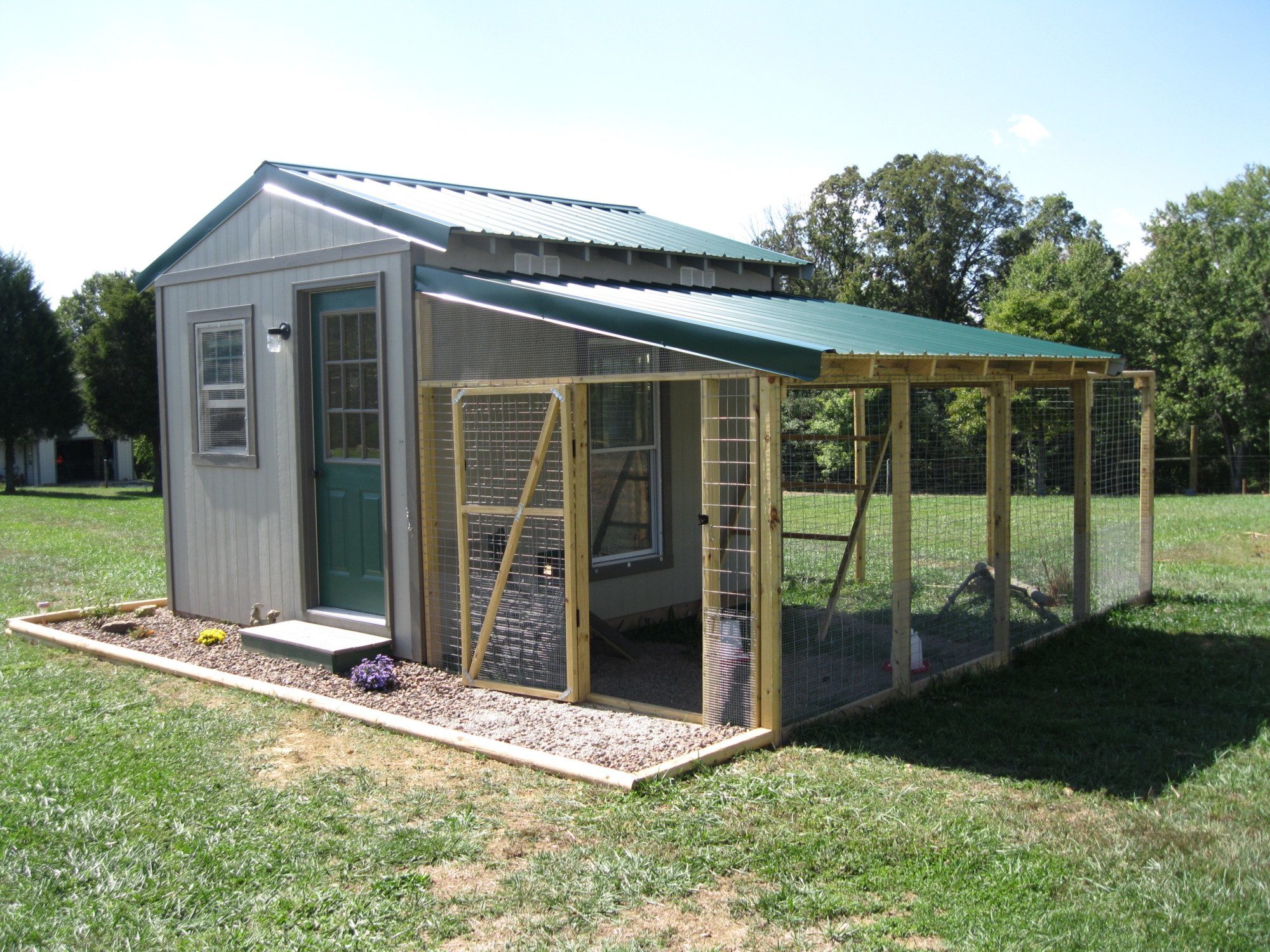 Finished coop - 9.5 x 12 housing + 164 sq. ft. run.  The 9.5 ft. resulted from DH not wanting to fool with a permit (required for any building 120 sq. ft. or greater).