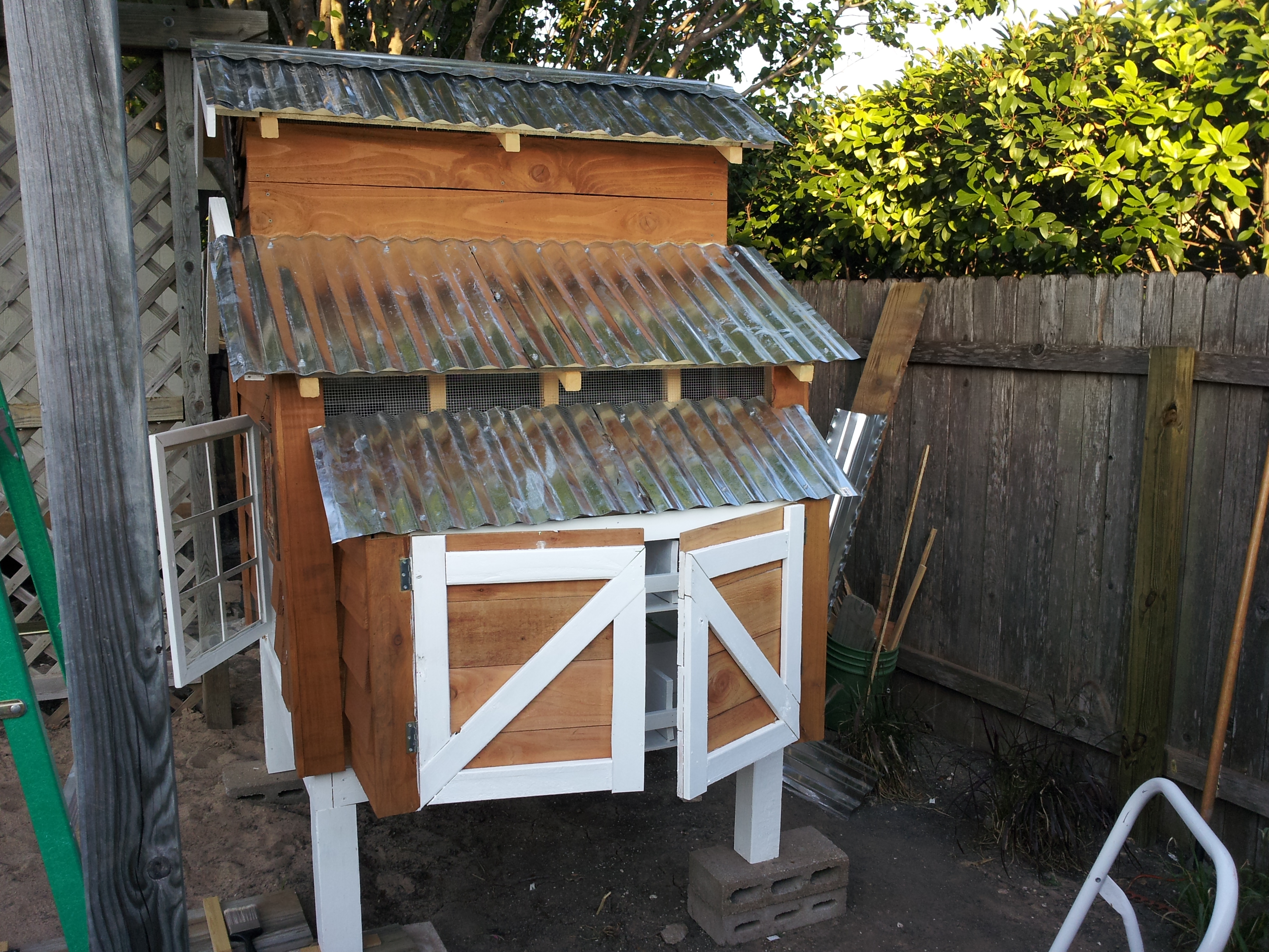 finished nesting box doors made of cedar pickets and 1 x 3's