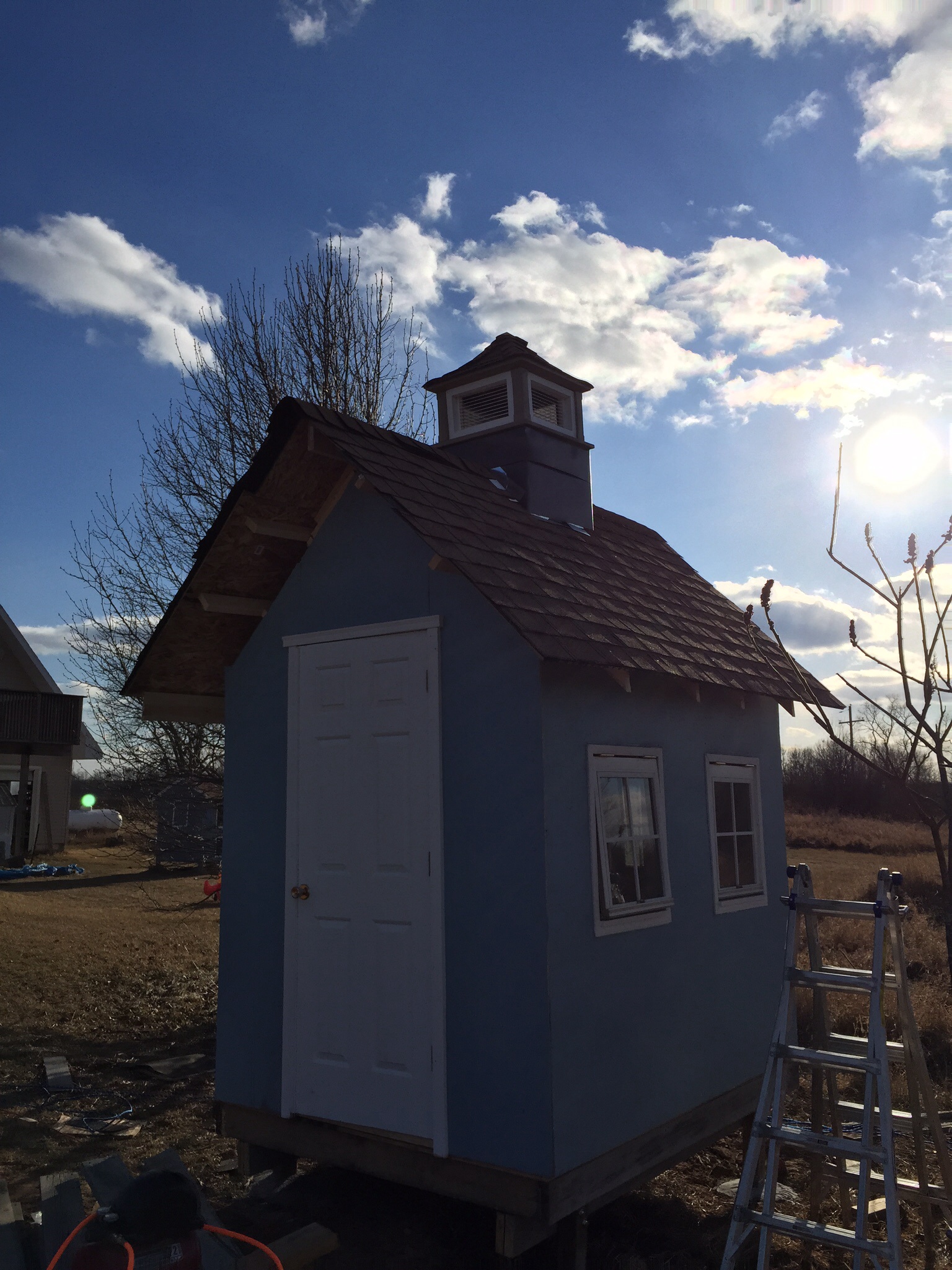 Finished shingling and adding the cupola.