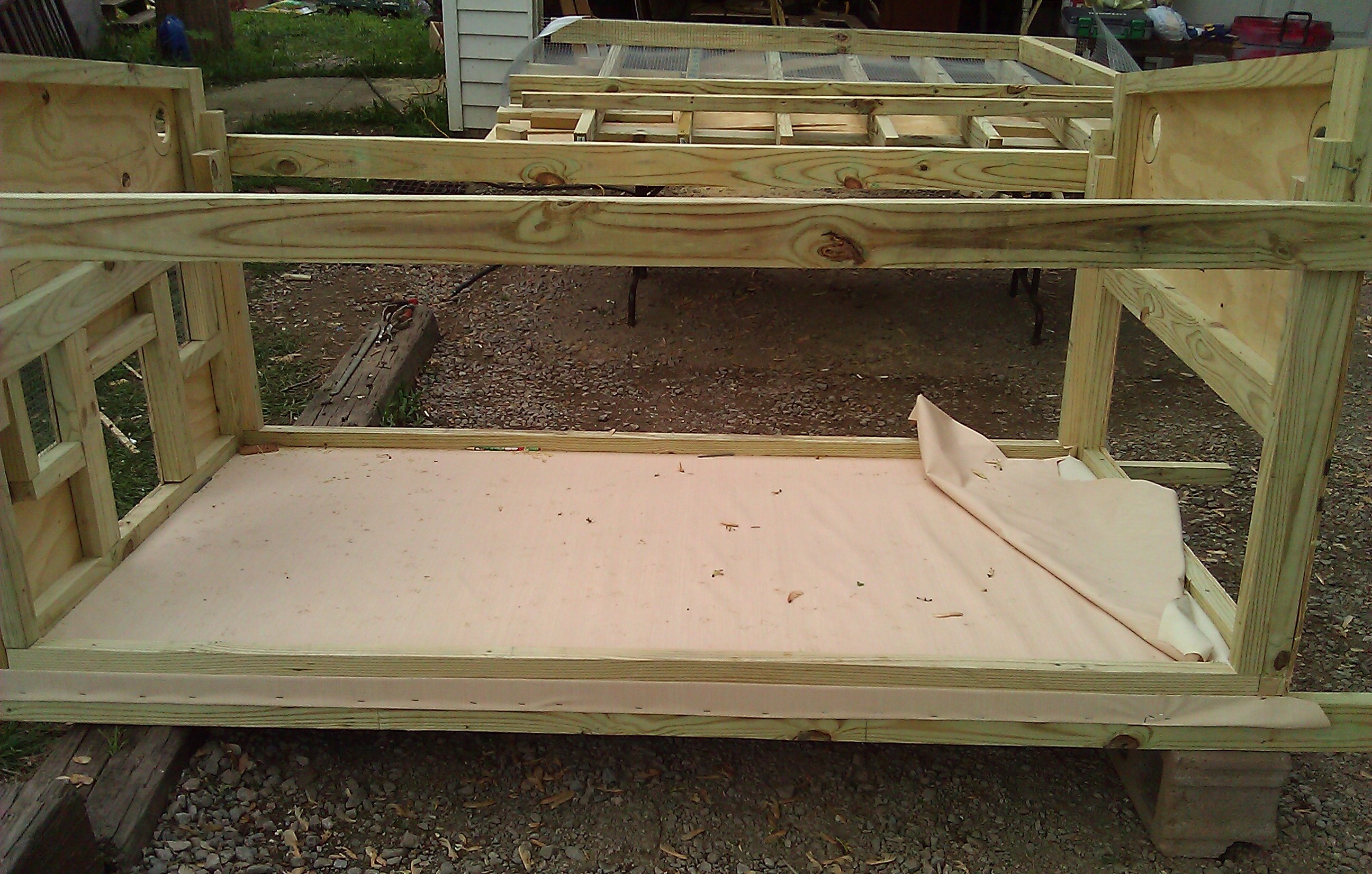 Floor and nest box to be (are) covered in a marine material to make it easy to clean out.