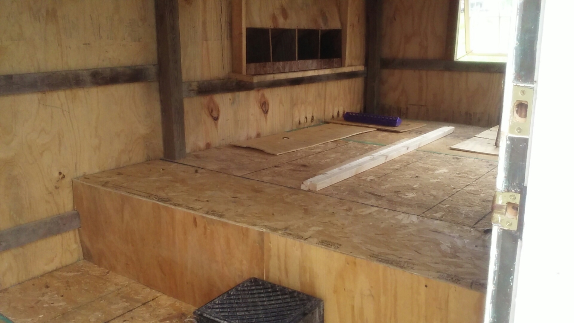 Floor in place, wall separating coop and storage still needed to be built.