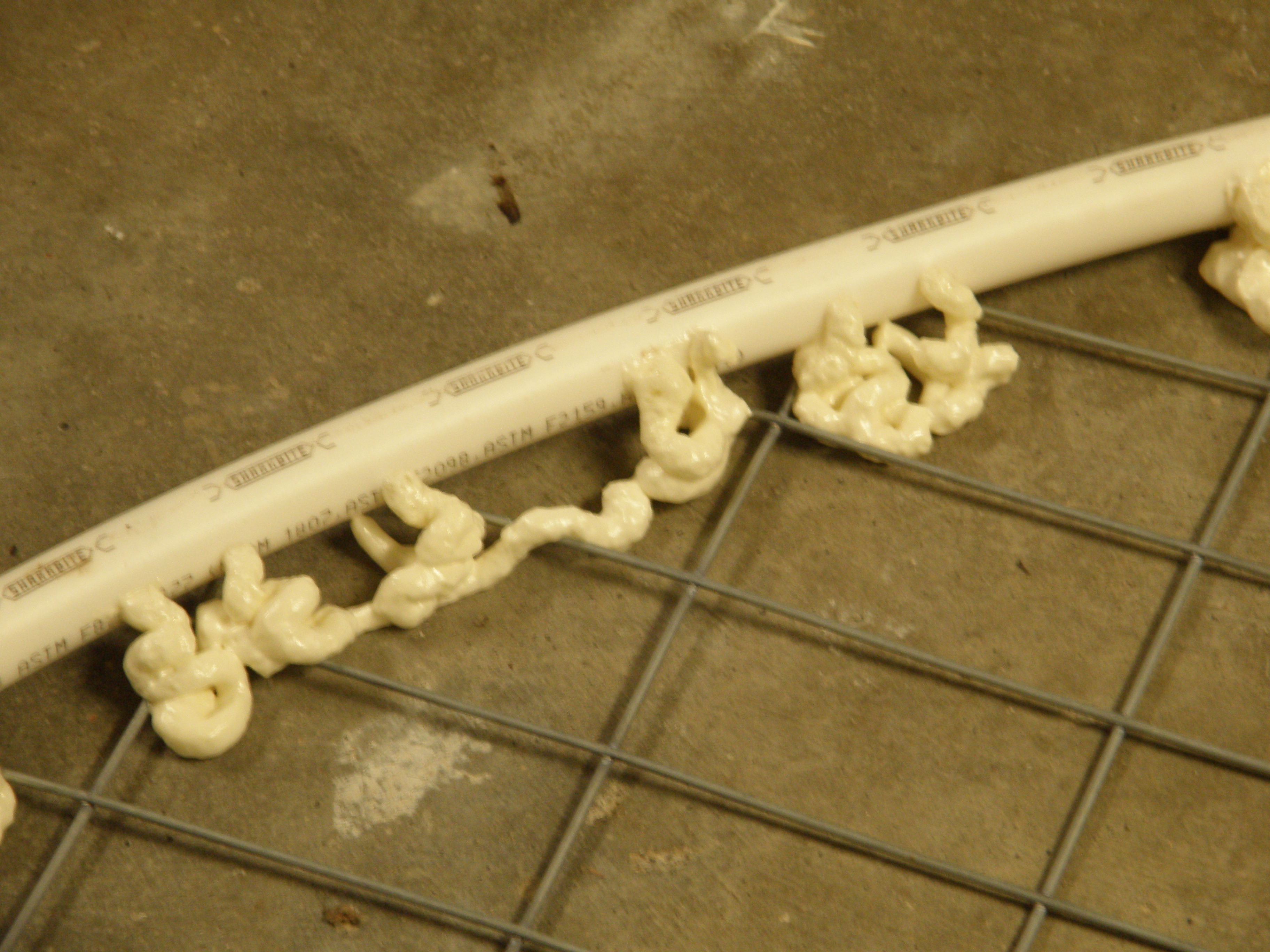 Foam fill holes used to bend over fence wire internally