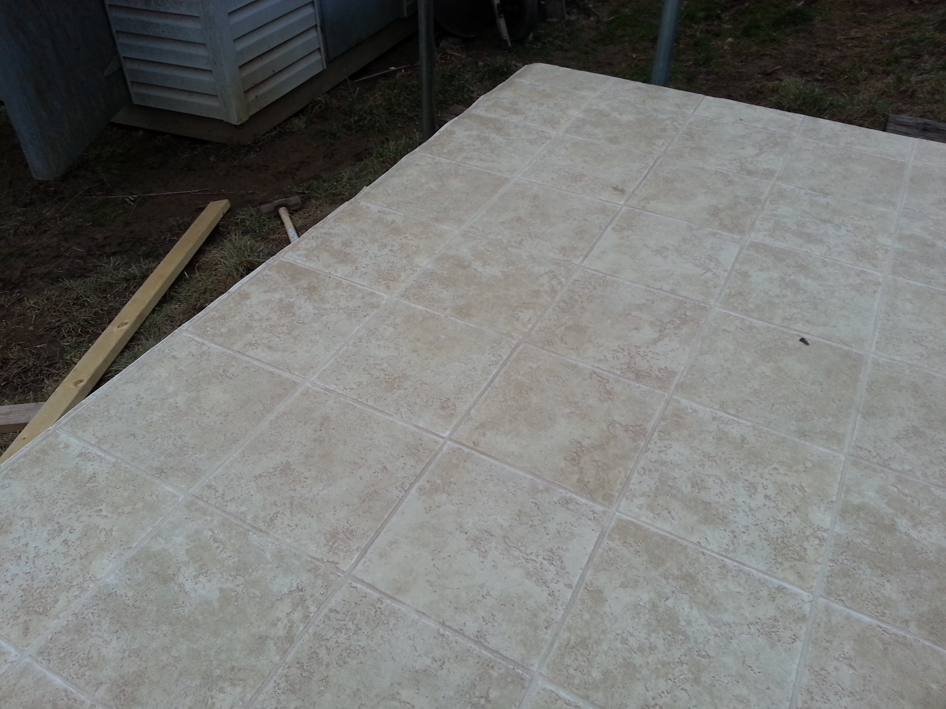 Found a piece of linoleum at lowes that was a 12'x8' sheet for pretty cheap. I put that on so clean up of the shavings would be easier that sticking to the wood.