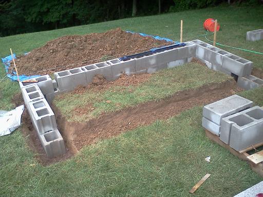 Foundation started.  It's on a hillside, so there are 3 rows of cinder blocks.