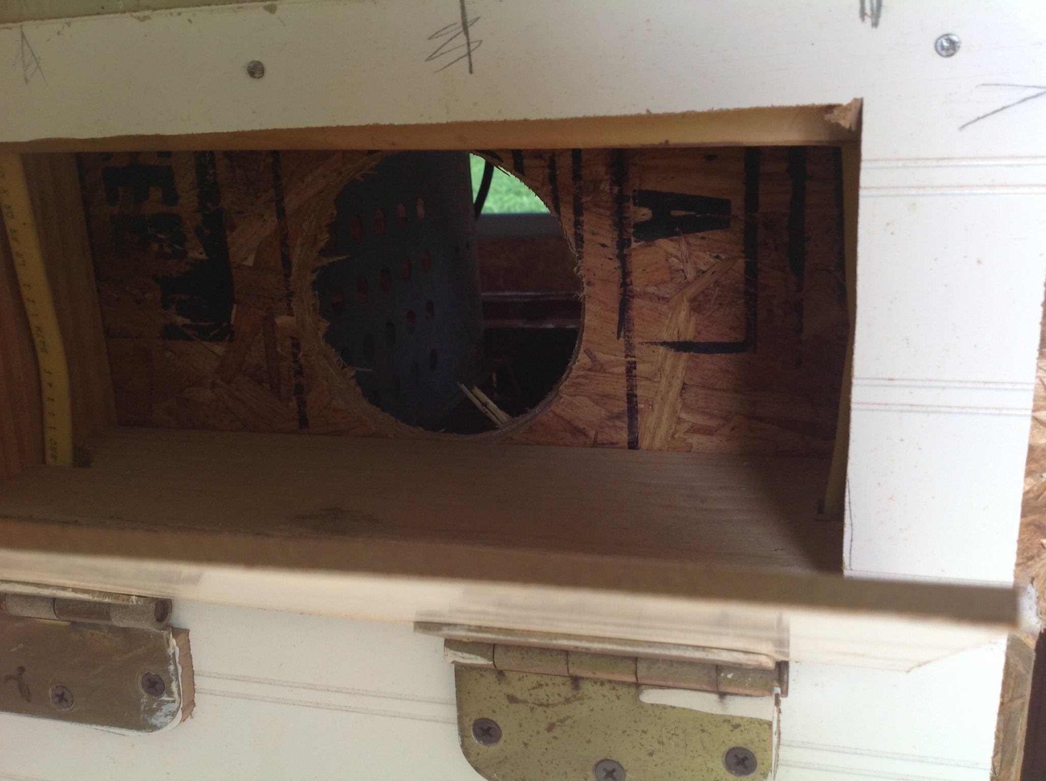 From inside the supply room these doors open and each nest can be accessed for egg gathering.