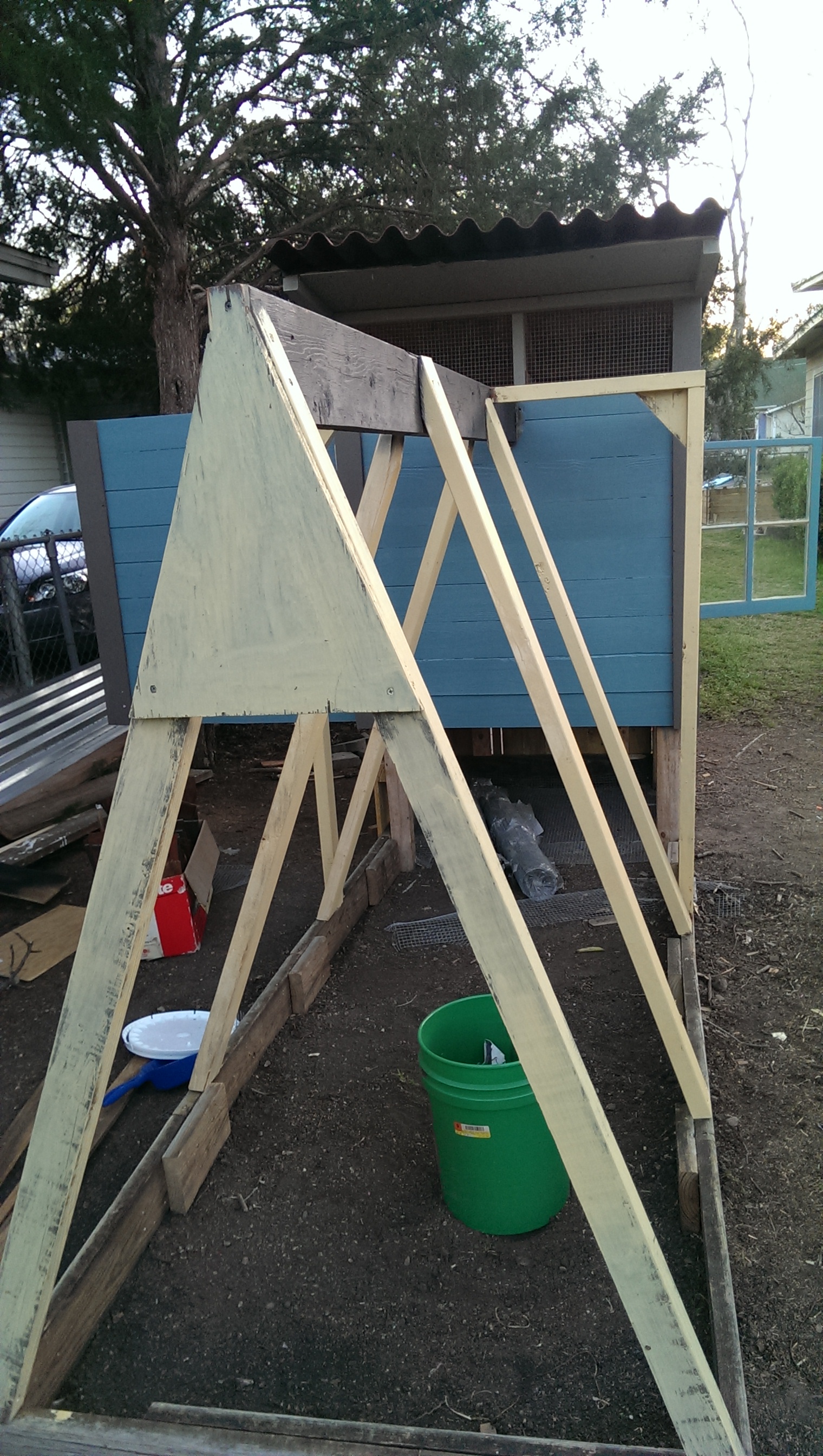 Front of the A-frame, painted the studs yellow and the main support beam to match the trim.