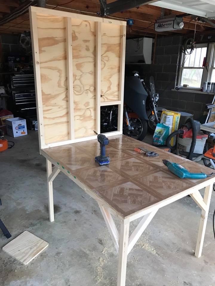 front wall with entrance door.