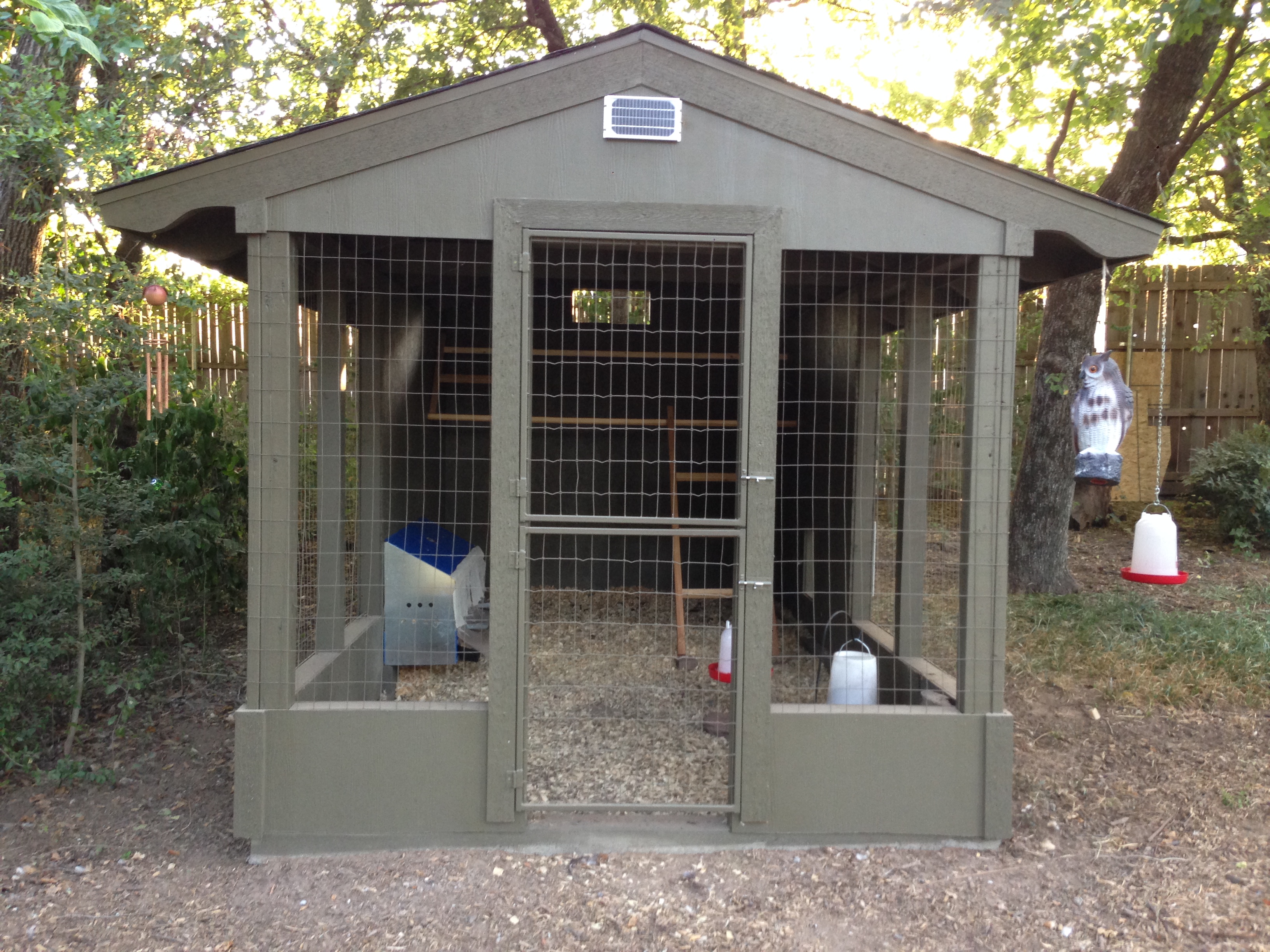 Front with Dutch door and solar panel for automatic chicken door.