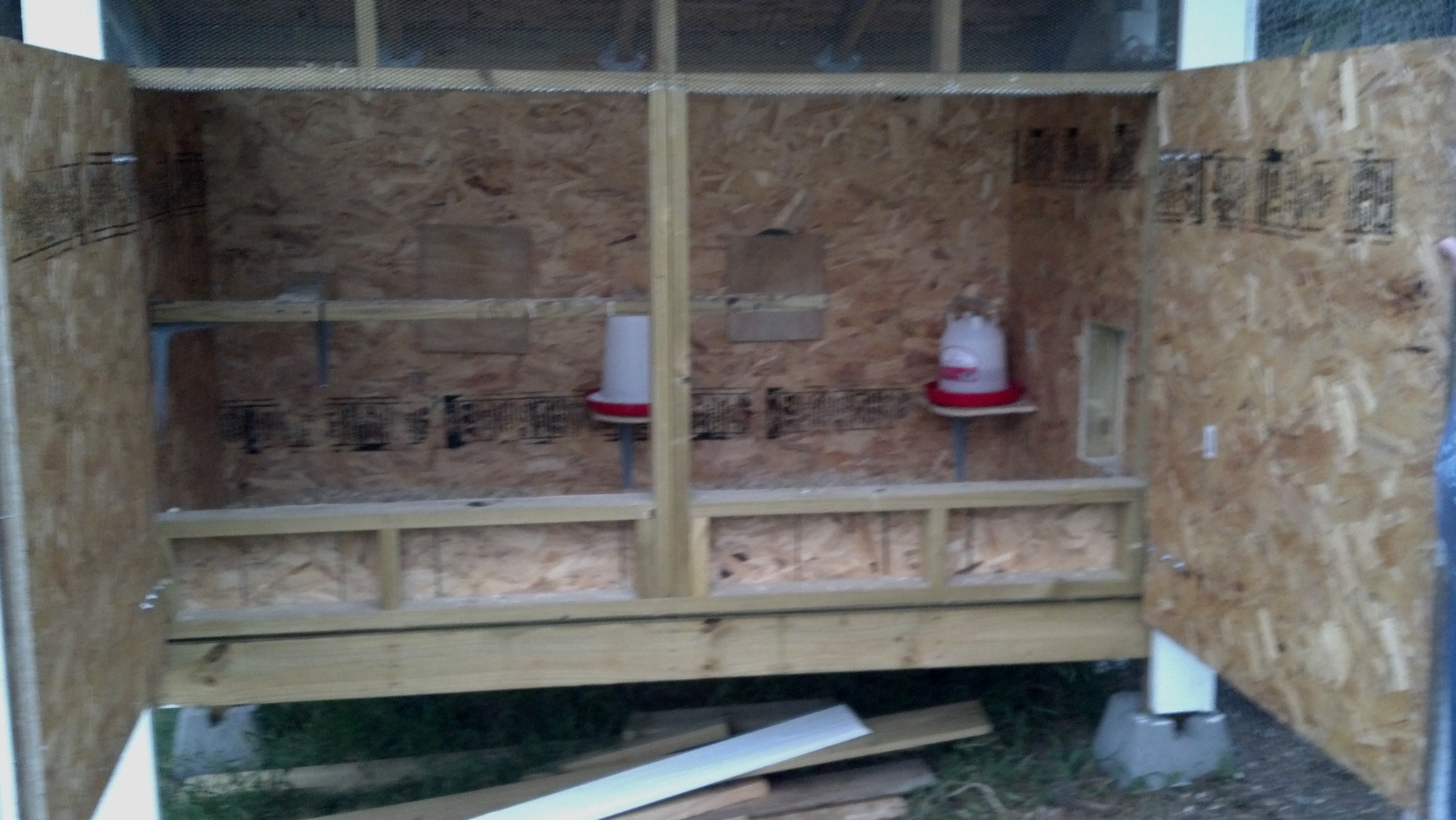 frt opens for cleaning. stub wall allows for build up up wood chips. plan to add new once a month for 3-4 months then clean and put in garden