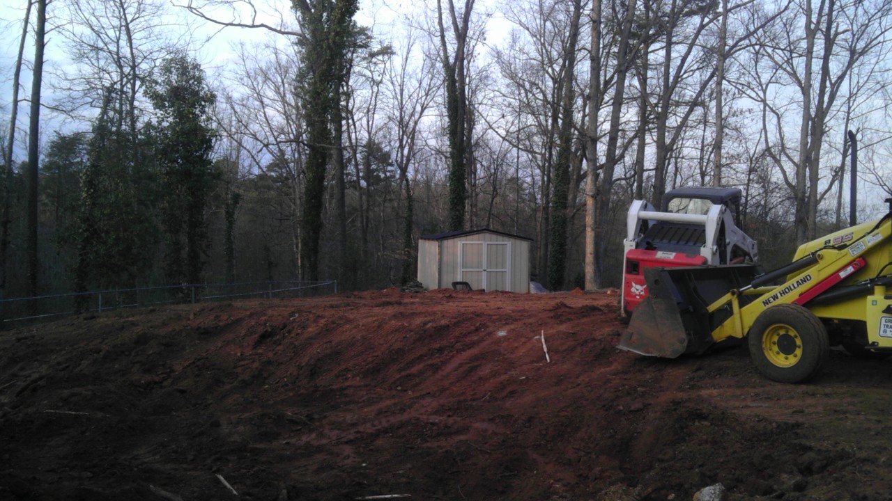 Grading my yard for the new chickens and garden.