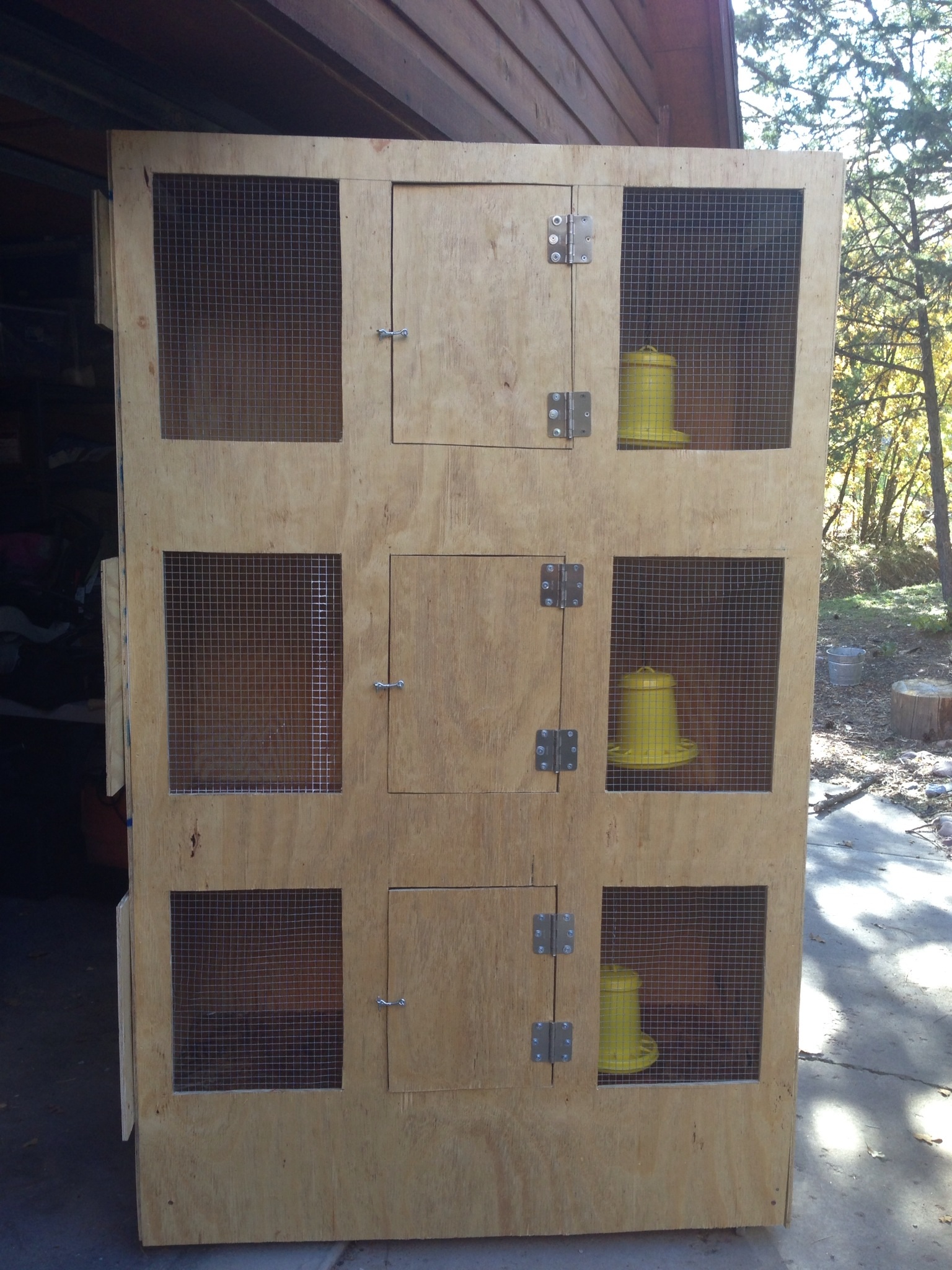 Hanging feeders in each compartment
