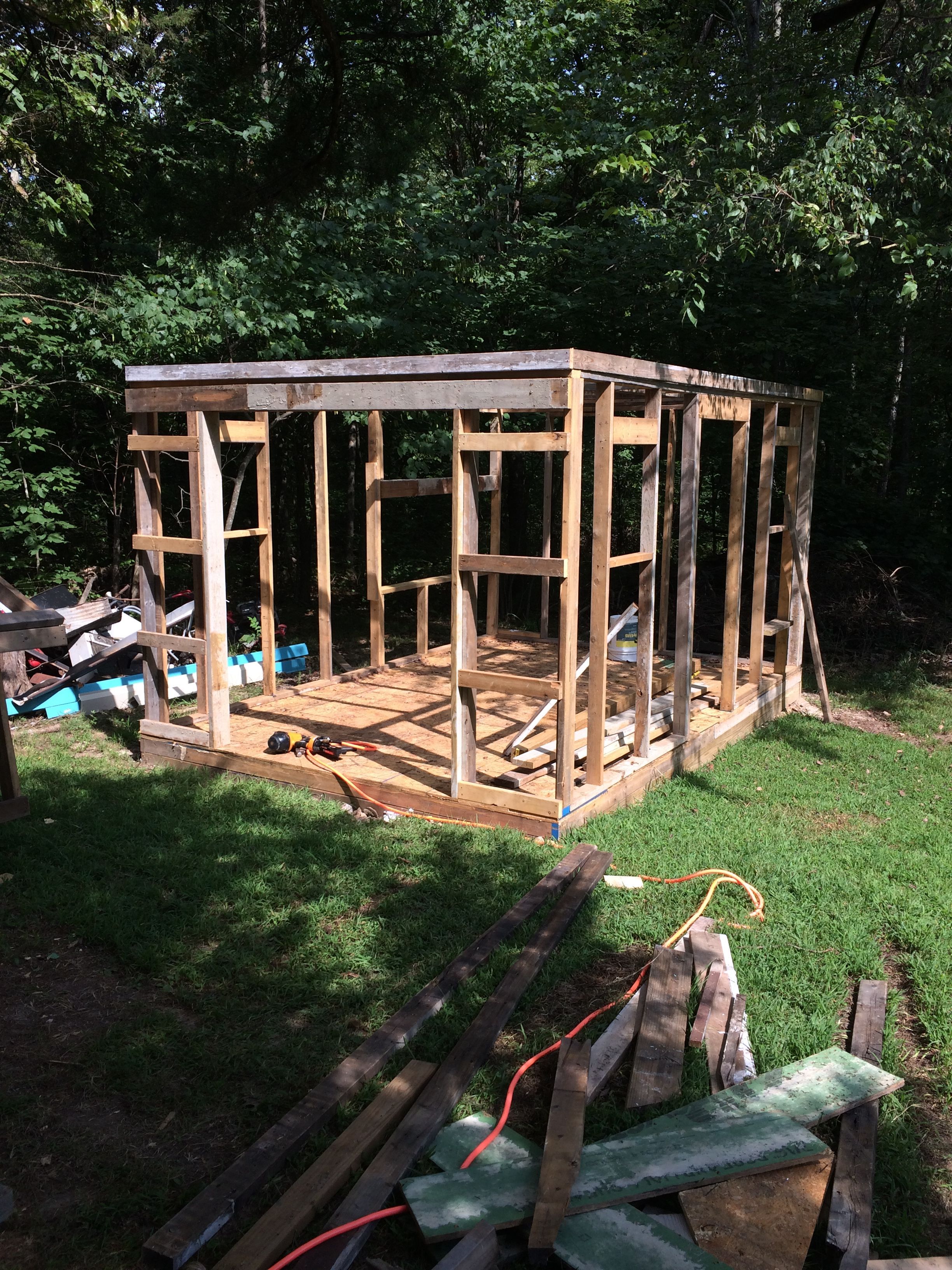 Hard to see but the 2'x4 ceiling and rim joists are lifted into place and secured.