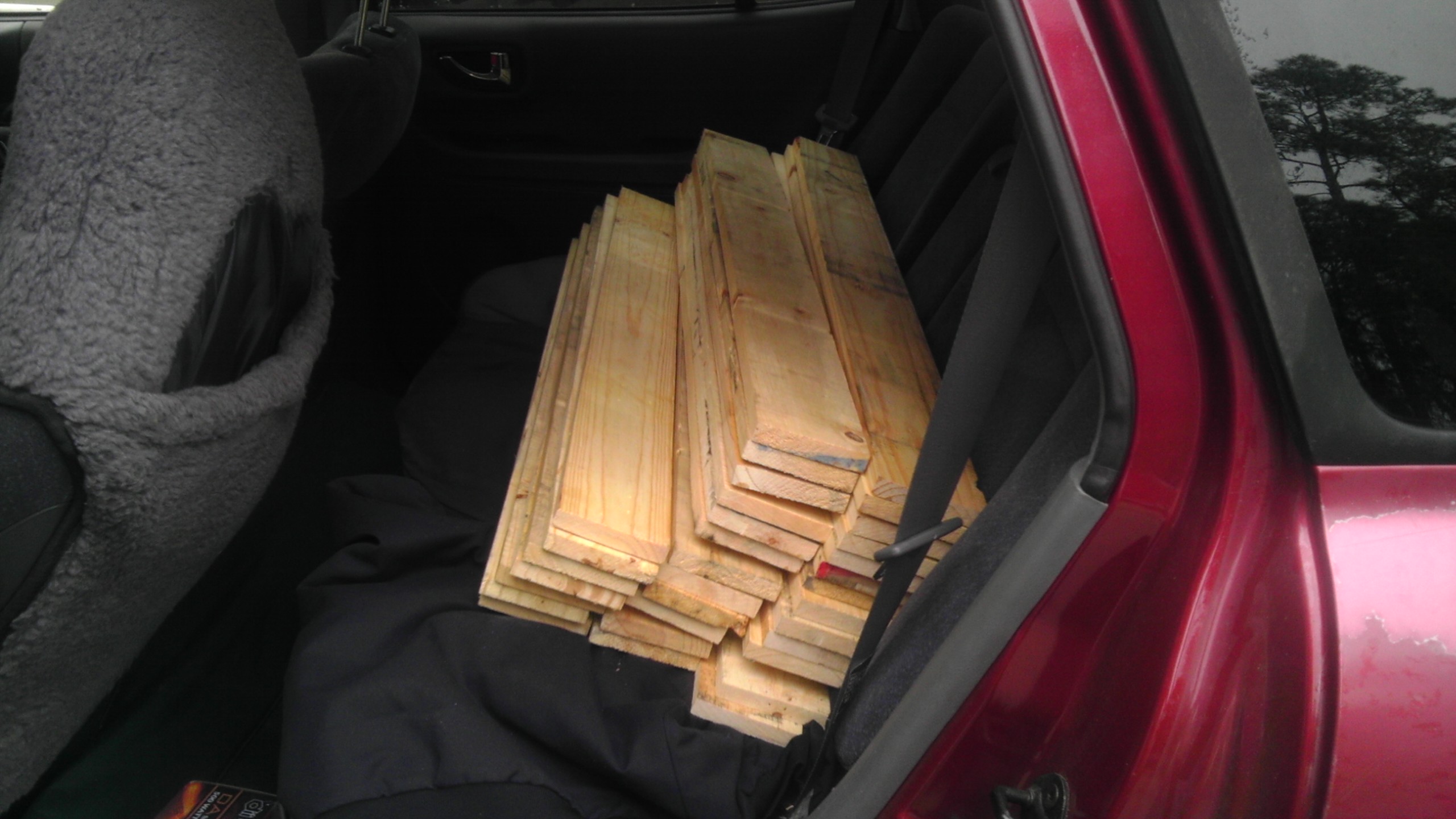 Here I'm loading the back seat with pallet boards.
