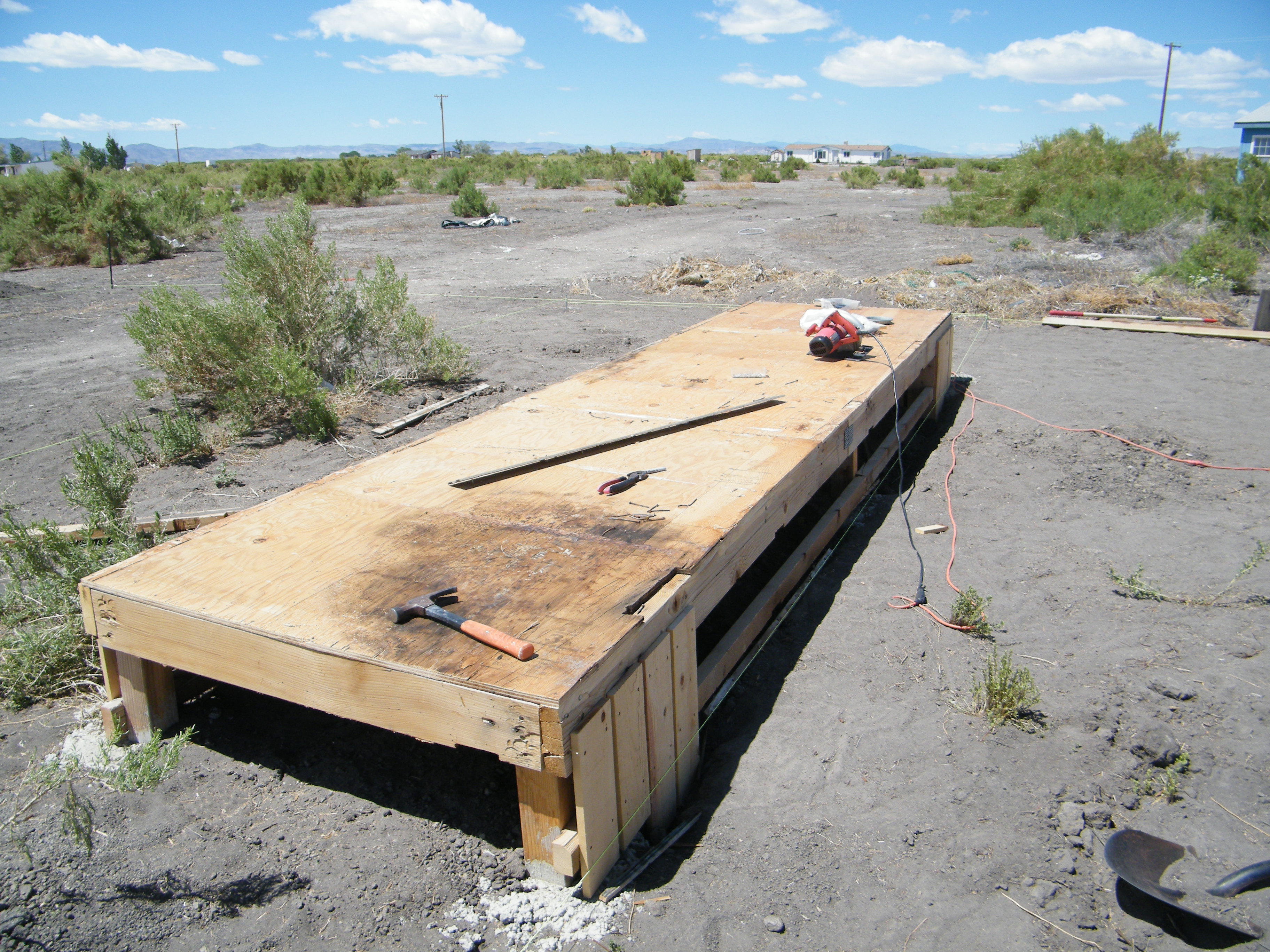 Here is the finished floor before tool clean up.  The fencing shown at both ends along the north side will run the entire length of the coop.  This is building on a budget.  I have to get more fence boards and then this side will look pretty nice.