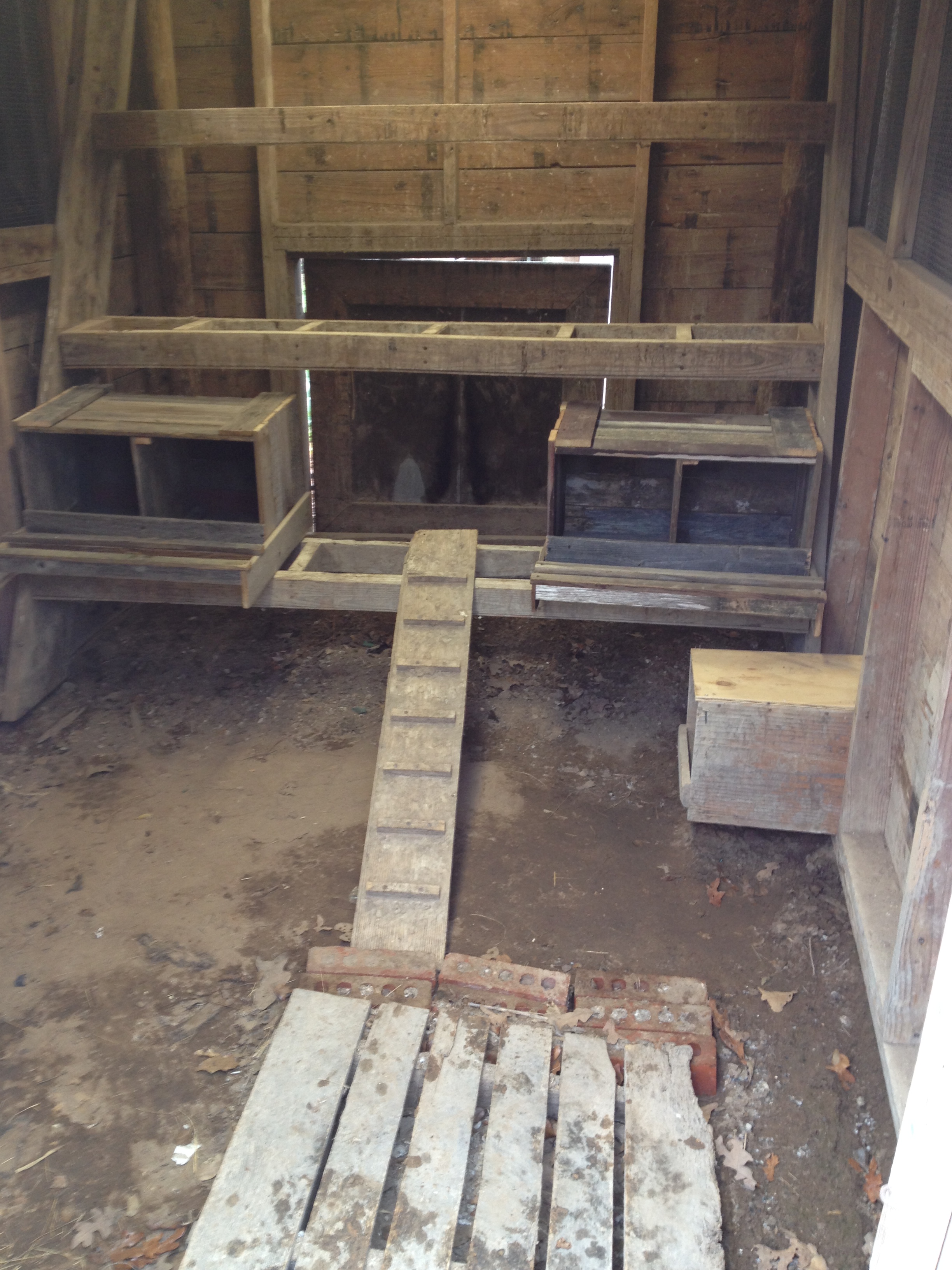 Here is the interior of the coop after some cleanup and with four new nest boxes installed. The nest boxes are made from re-purposed fence wood. The "ladder" could be replaced, but fundamentally as soon as I get feed, water, and pine shavings in here (and eventually straw for the nests) the building is ready for my birds.