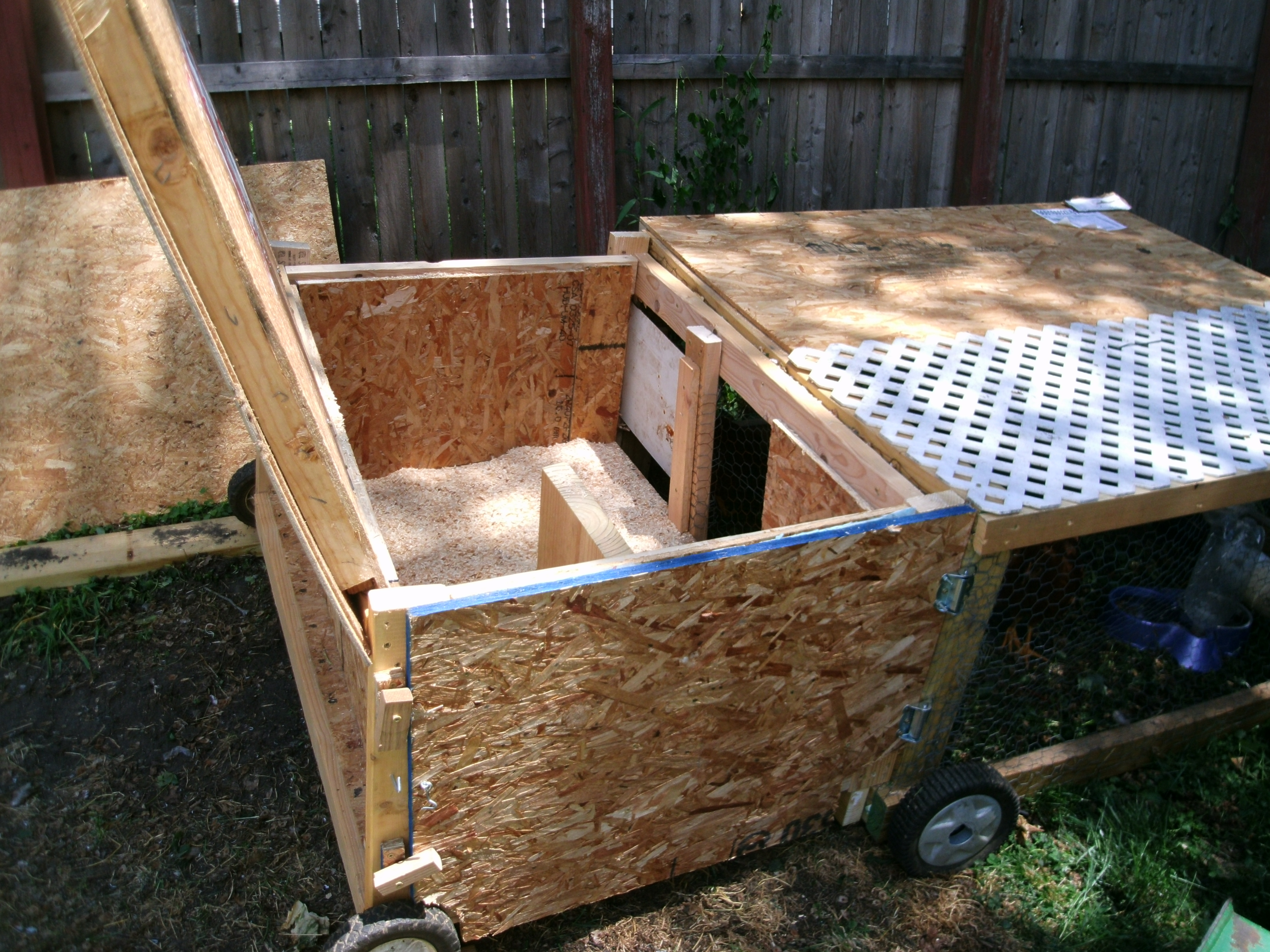 Here is the original cage part with the coop add-on. The lid lifts up so I can clean it.