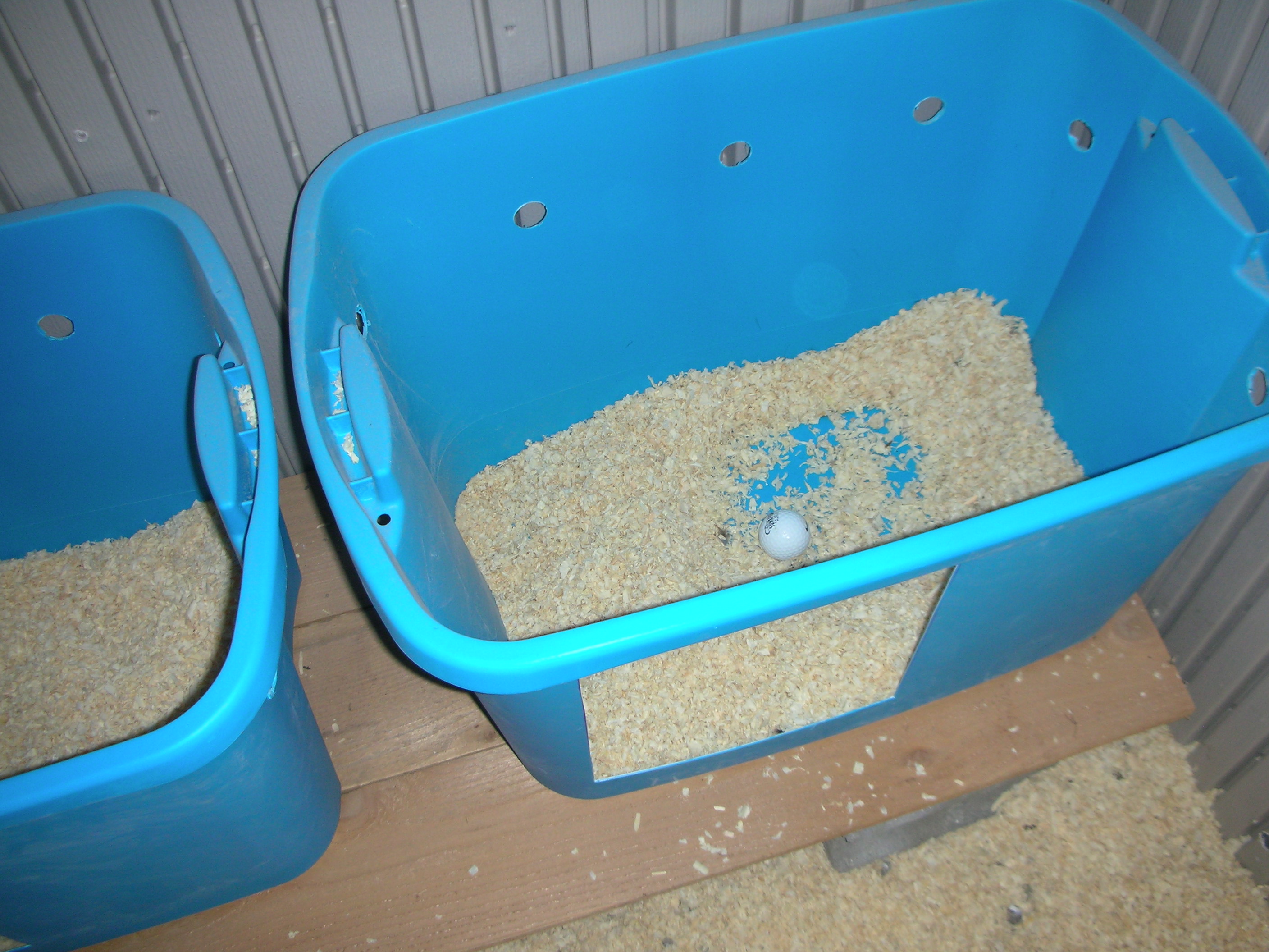 Here the hinged lid is up so you can see inside better. Note the ventilation holes I drilled into them.