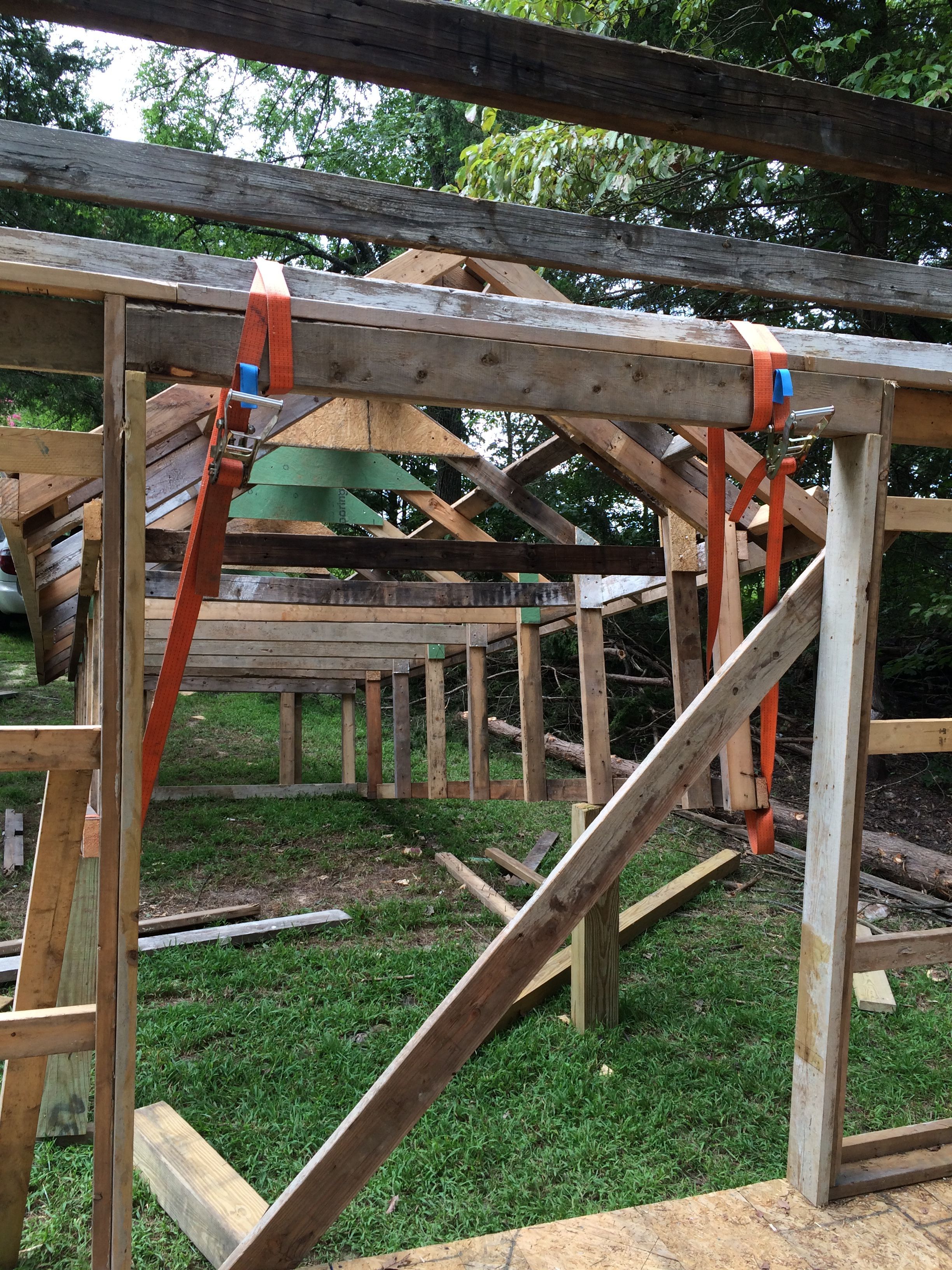 Here you can see the straps I used to lift one end of the roof onto the ceiling joists.