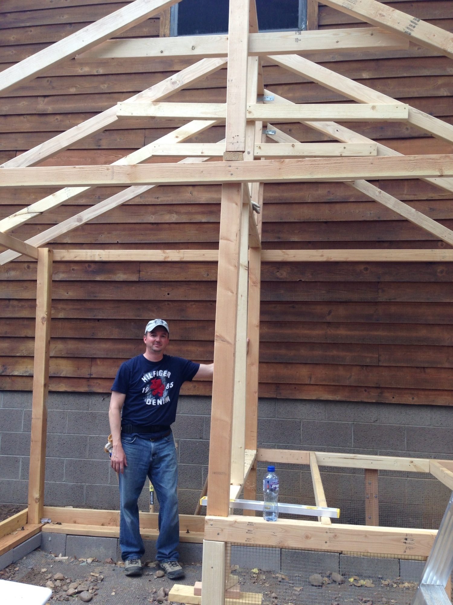 Here's the dearest husband who worked before & after going to the office to make our very first coop.