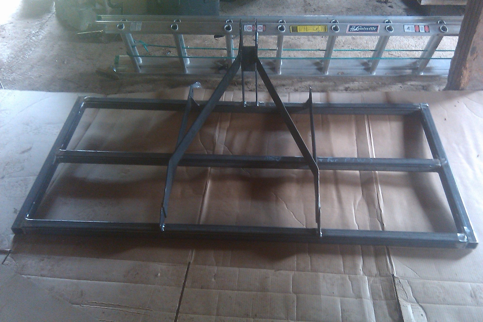 Hiller / Cultivator Cat 1 attachement I built 2x2x1/4wall tubing 6'x3' on 1' center.  1/4x3 HRFB for 3 point