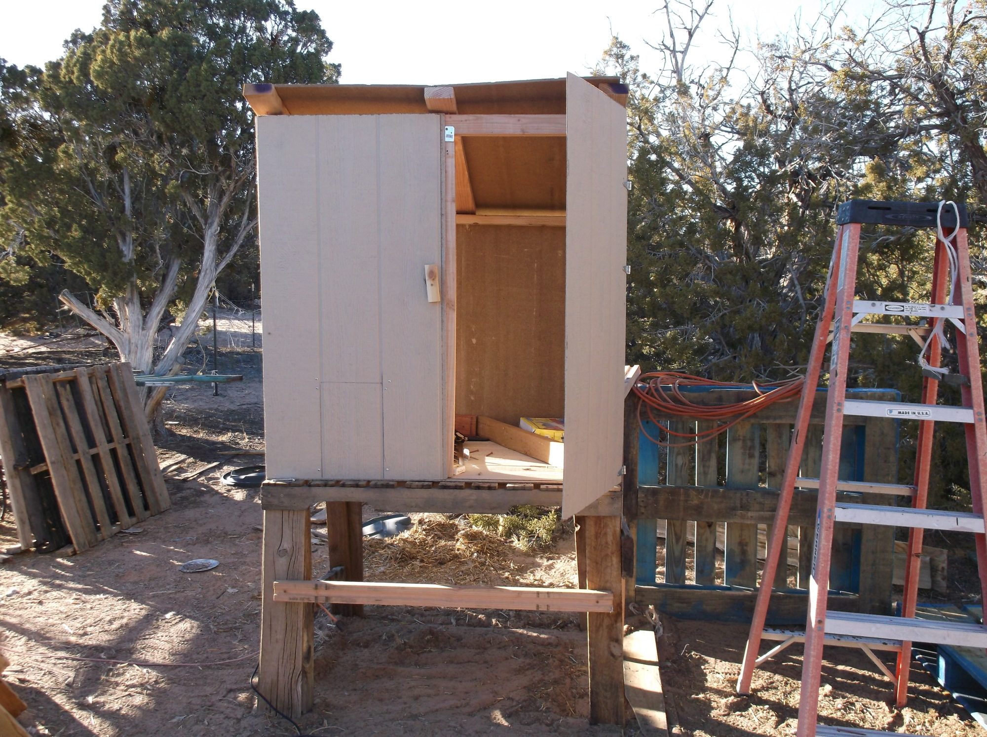 hinged door in the front of the hutch.