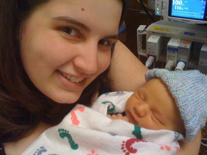 Holding Luke for the first time, 2 days after birth.