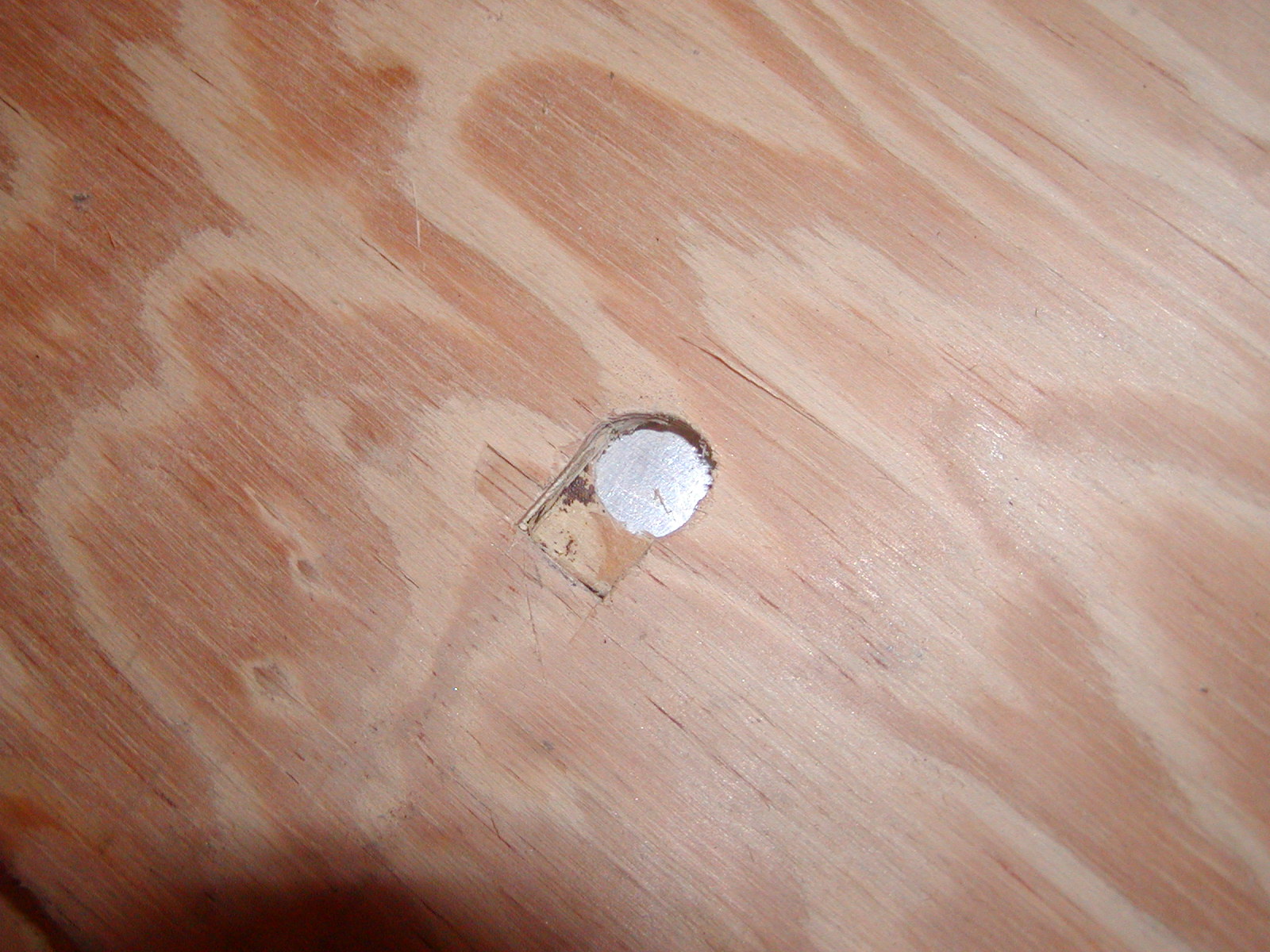 Hole in floor for nipple - close-up