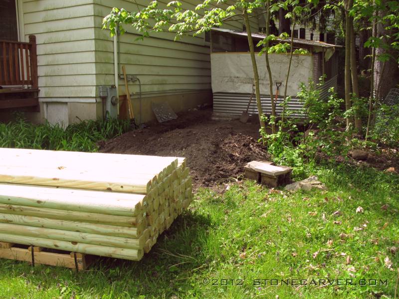 Home Depot had landscape timbers on sale for less than $2.00 each, so that gave the idea of a strong log cabin coop.