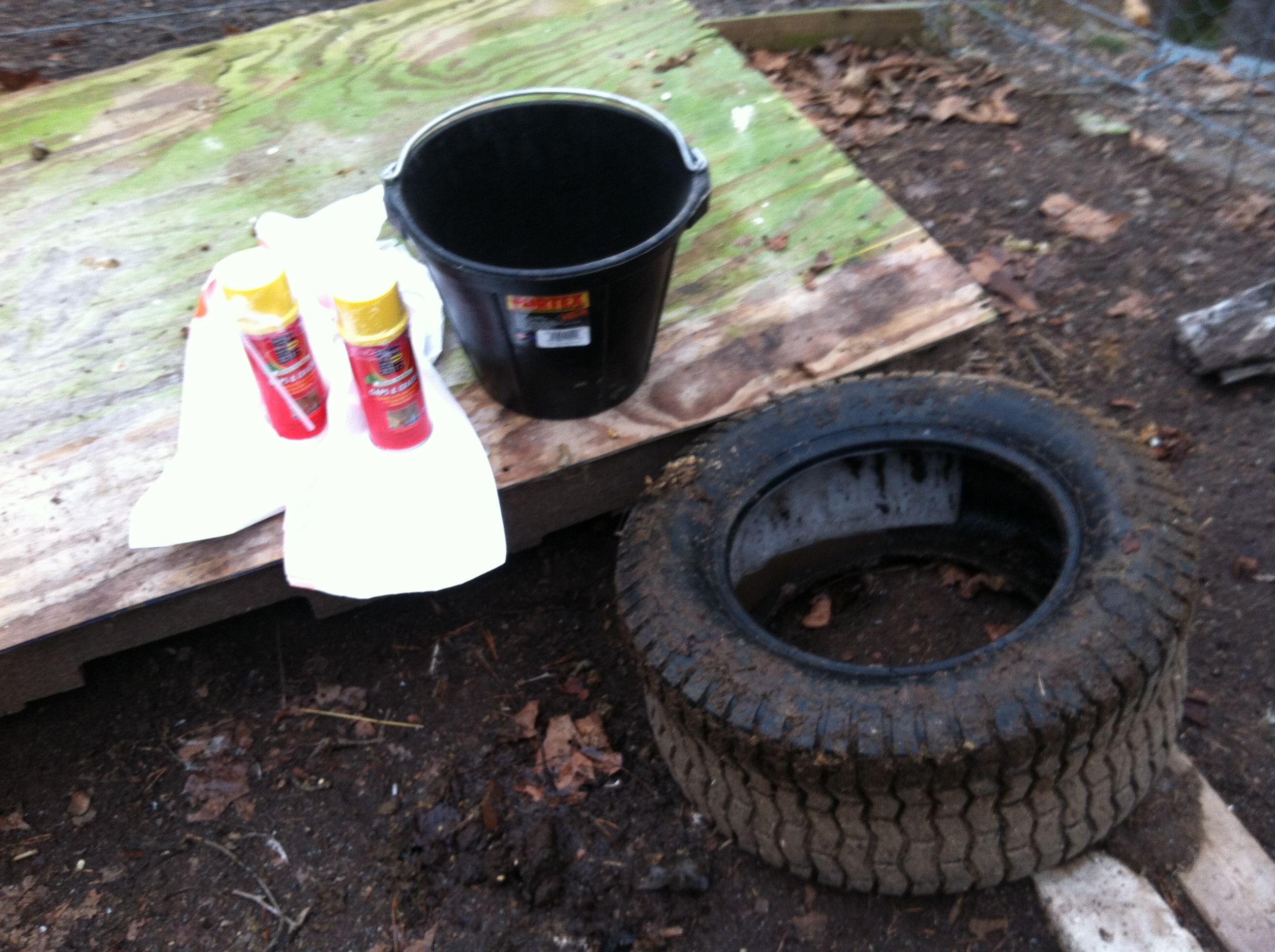 how to make a freeze proof waterer
Rubber bucket that fits in side a lawnmower tire.
Plastic bag to line bucket so foam wont stick.
2-3 cans foam sealer.