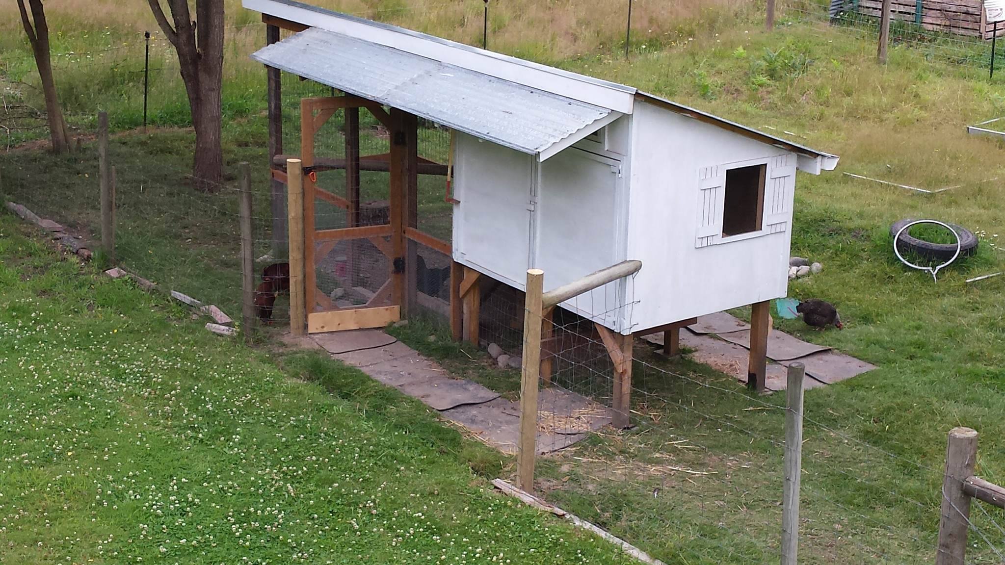 I added a fence post and move the fence so we can access the coop doors without actually entering the chicken pasture.