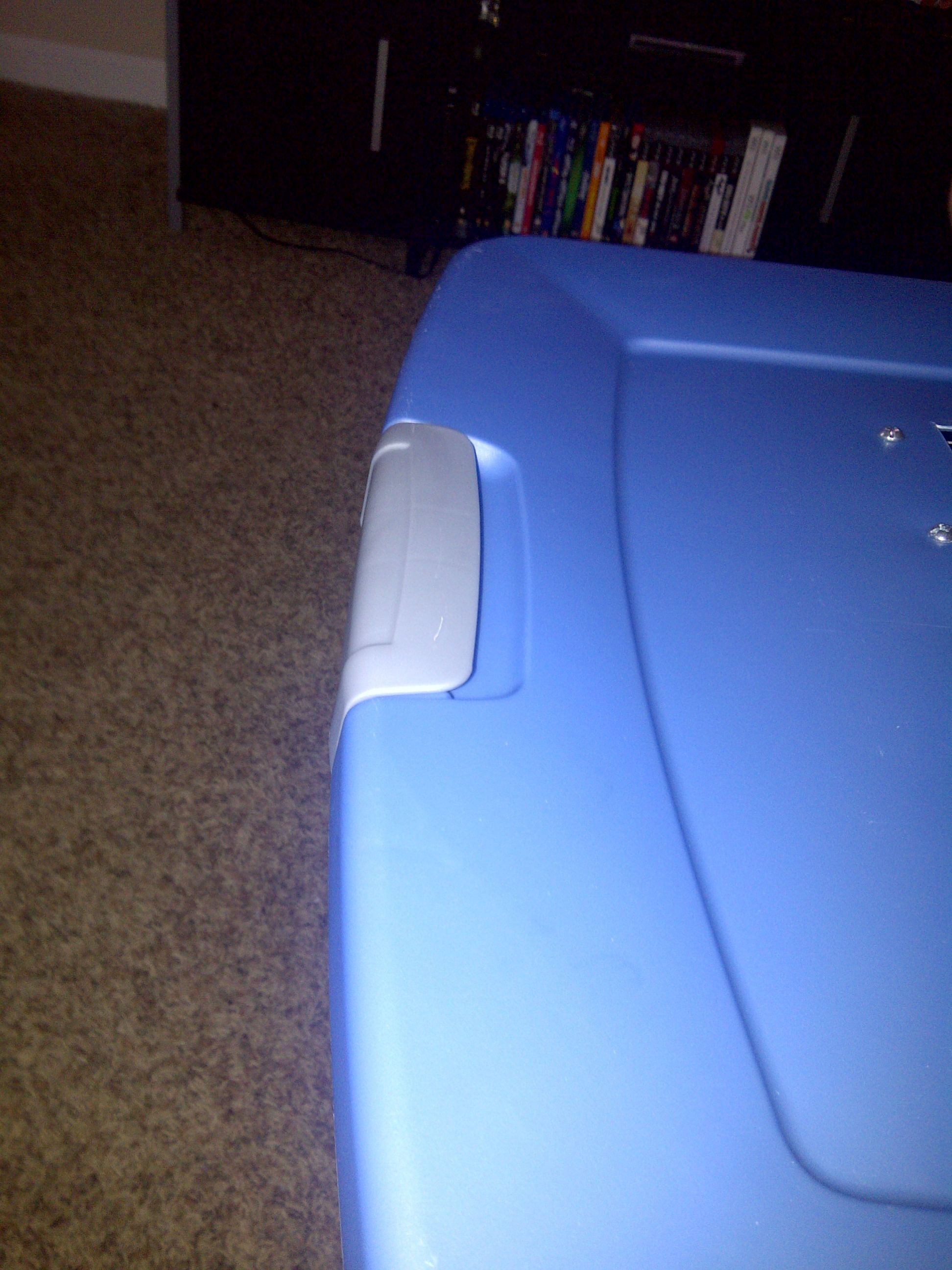 I bought one with a locking handle lid. As I mentioned before we have cats so I thought this would be a better option.