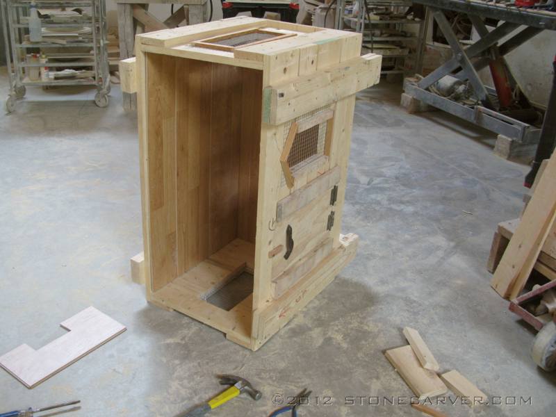I cut in windows and a hinged door, lots of ventilation.