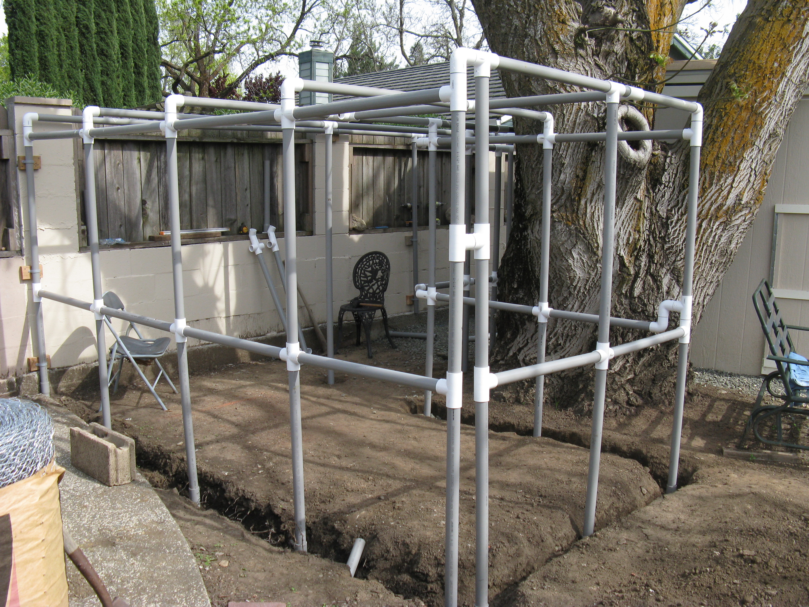 I decided to use conduit to build the frame for the run. The pipe and wire is set in 6 inches of concrete.